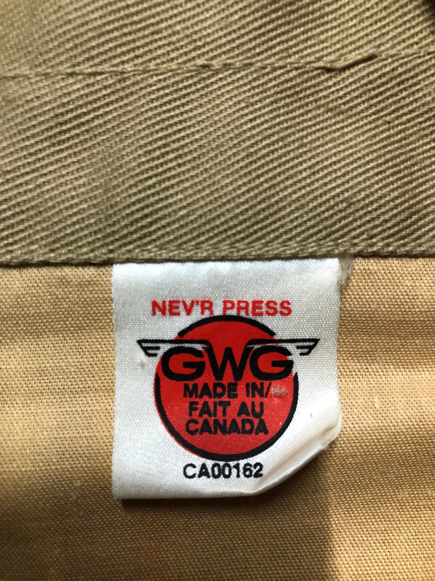 Kingspier Vintage - GWG (Great Western Garment Co.) “Nev’r-press” 1970’s western style denim jacket in tan with snap closures and two flap pockets. Made in Canada. Size 40Lrg.