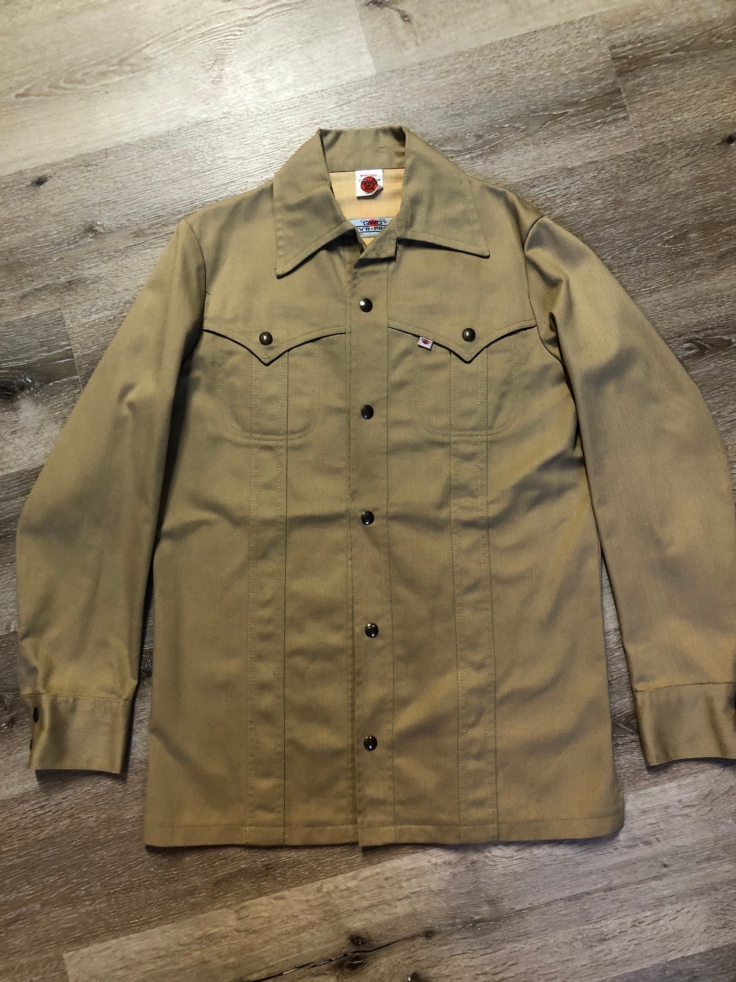 Kingspier Vintage - GWG (Great Western Garment Co.) “Nev’r-press” 1970’s western style denim jacket in tan with snap closures and two flap pockets. Made in Canada. Size 40Lrg.