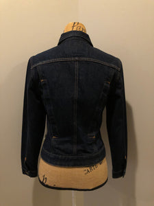 Kingspier Vintage - Guess denim jacket in a dark wash with button closures, two flap pockets on the chest and gold stitching. Size medium