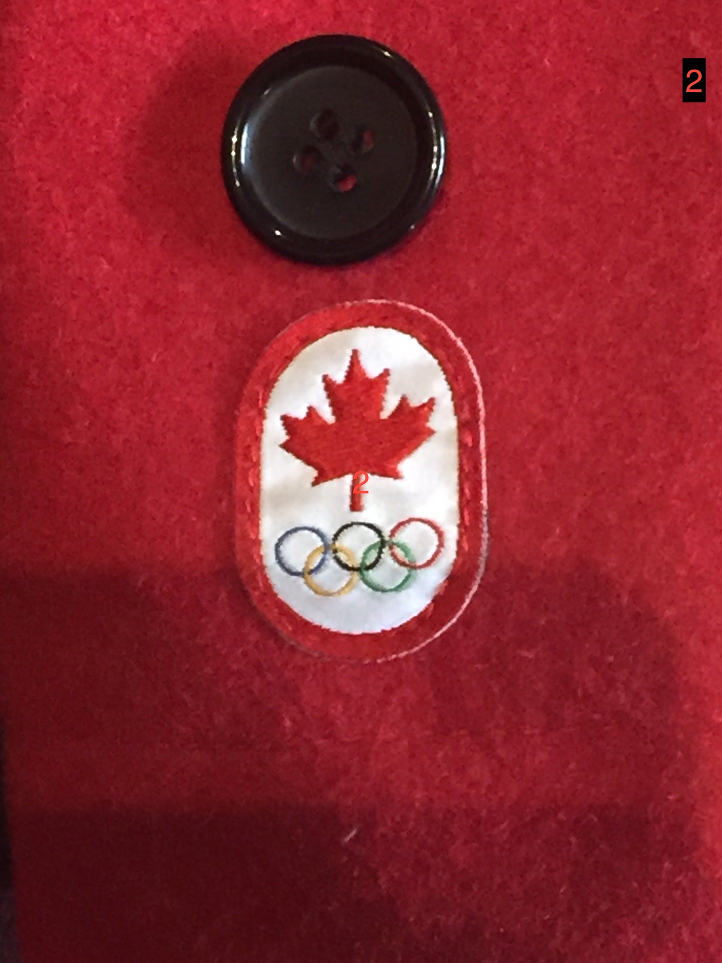 Kingspier Vintage - Hudson’s Bay Company official 2014 Olympics duffle coat in red with hood, toggles, zipper and flap pockets. Size is small.