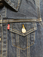 Load image into Gallery viewer, Kingspier Vintage - Levi’s Original Trucker Jacket in a medium wash denim with Canada leaf patch on the left shoulder, button closures, two vertical pockets and two flap pockets on the chest. Size XS.
