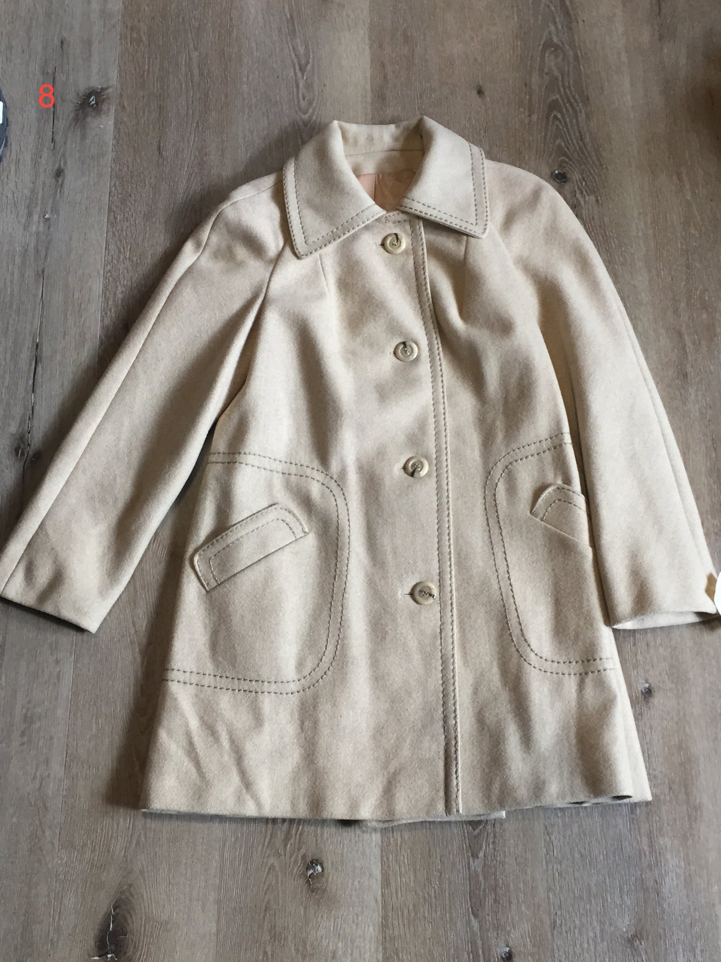 Kingspier Vintage - Country Pacer beige wool car coat with unique stitched detailing around trim, white buttons and welt pockets. Union made in the USA. Size small/ medium.