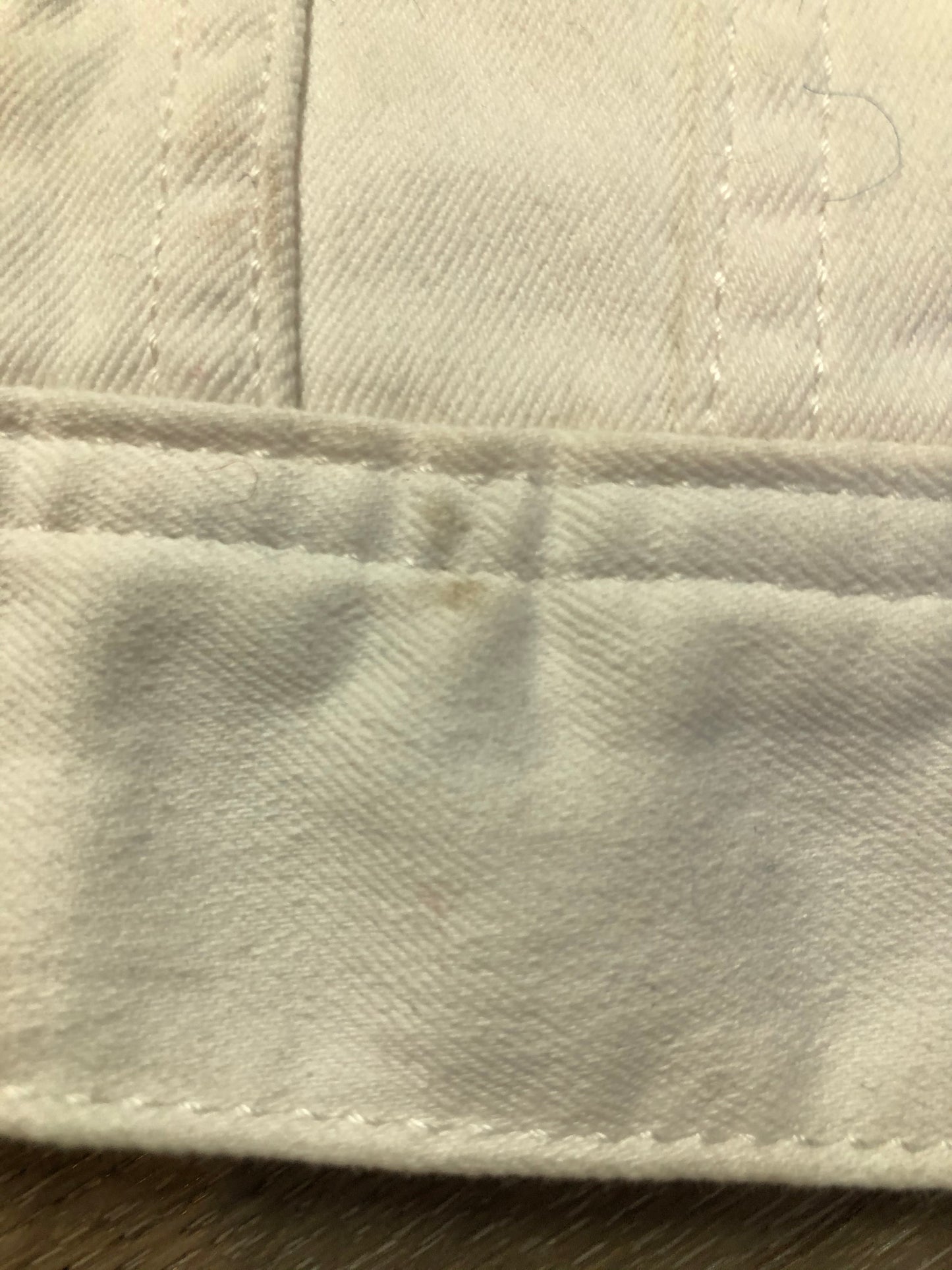 Kingspier Vintage - Talbots denim jacket in white with button closures, two vertical pockets and two flap pockets on the chest. Size small petite.