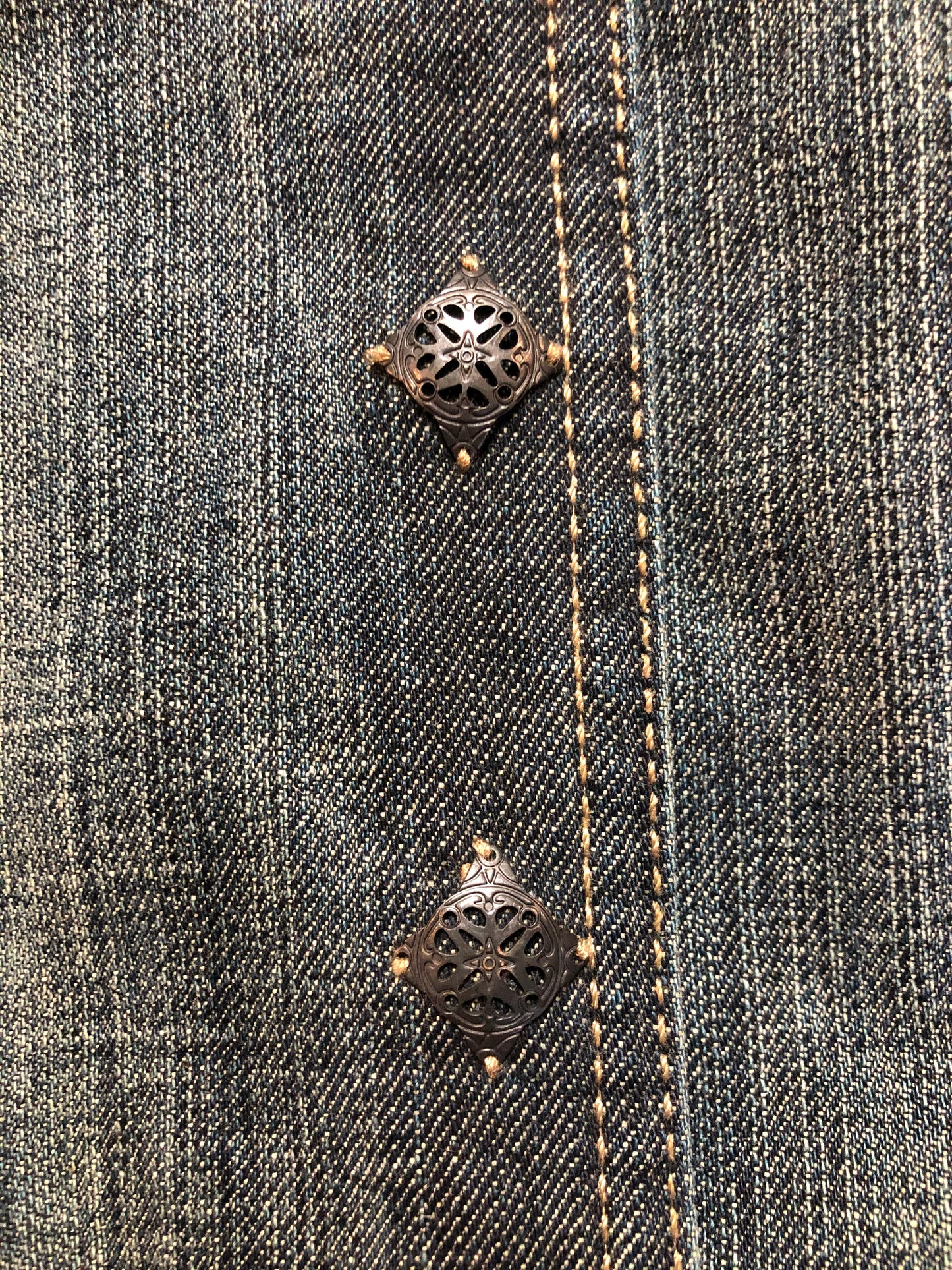 Kingspier Vintage - Elie Tahari denim jacket in a faded dark wash with beaded velvet collar, decorative snap closures, deep green velvet belt and a beautiful patterned silk lining. Size small.