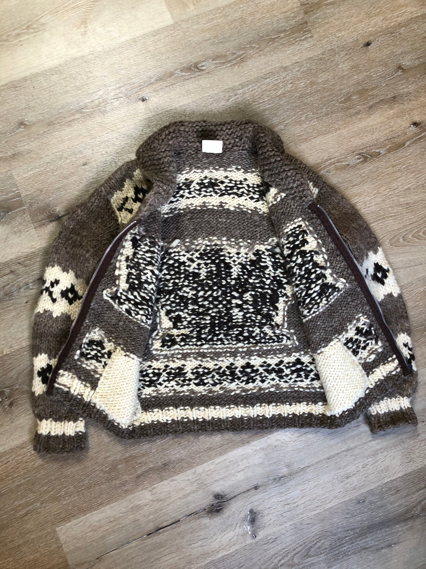 Kingspier Vintage - Cowichan style hand spun and hand knit wool zip cardigan in taupe brown, beige, white and dark brown with thunderbird design, shawl collar, zipper and pockets.