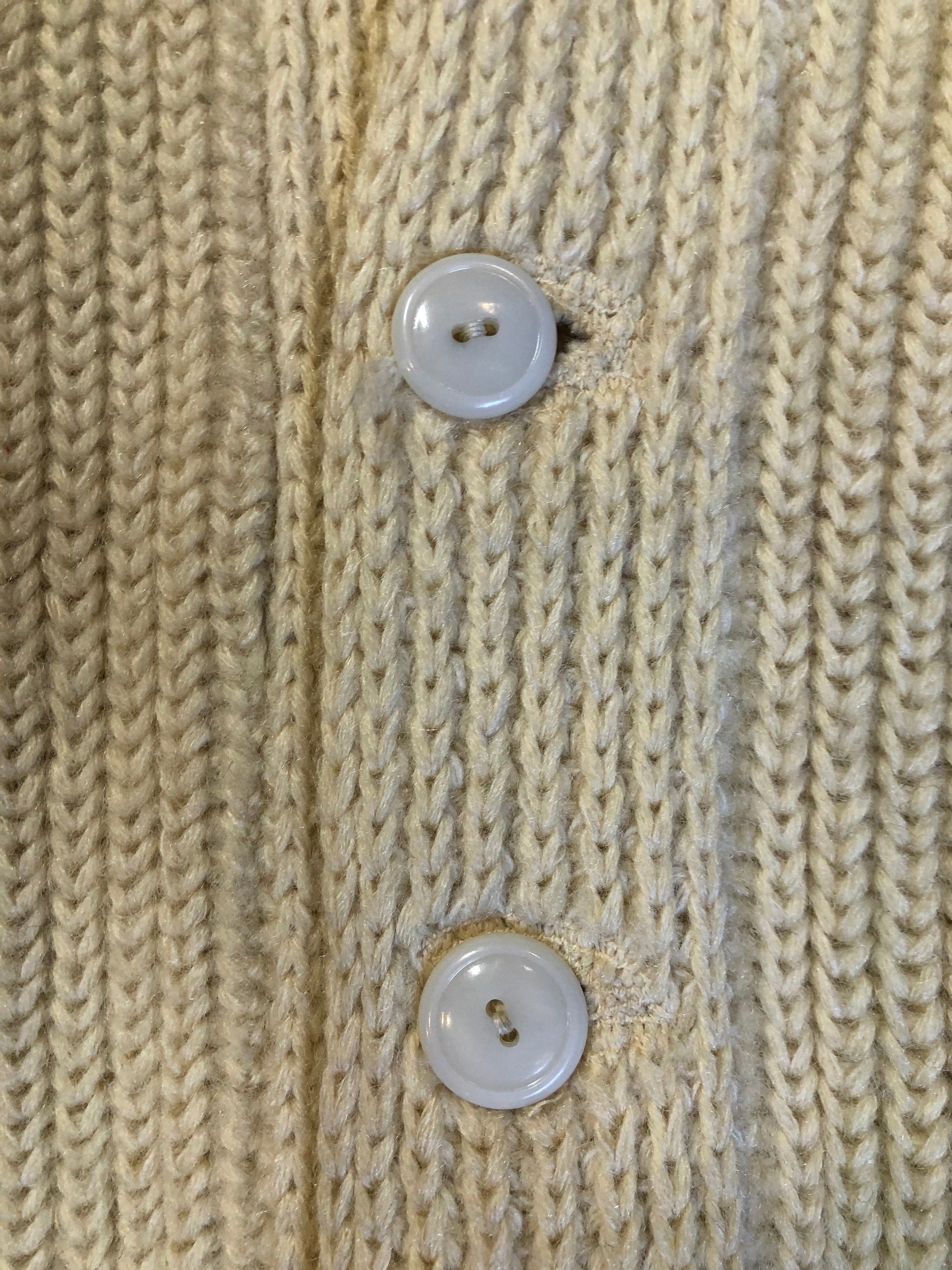 Kingspier Vintage - Curl-Rite by Rice-Knit Sportswear 1950’s curing sweater in cream with red and black strip details, shawl collar, button closures and pockets. 100% wool. Size medium. Made in Nova Scotia.