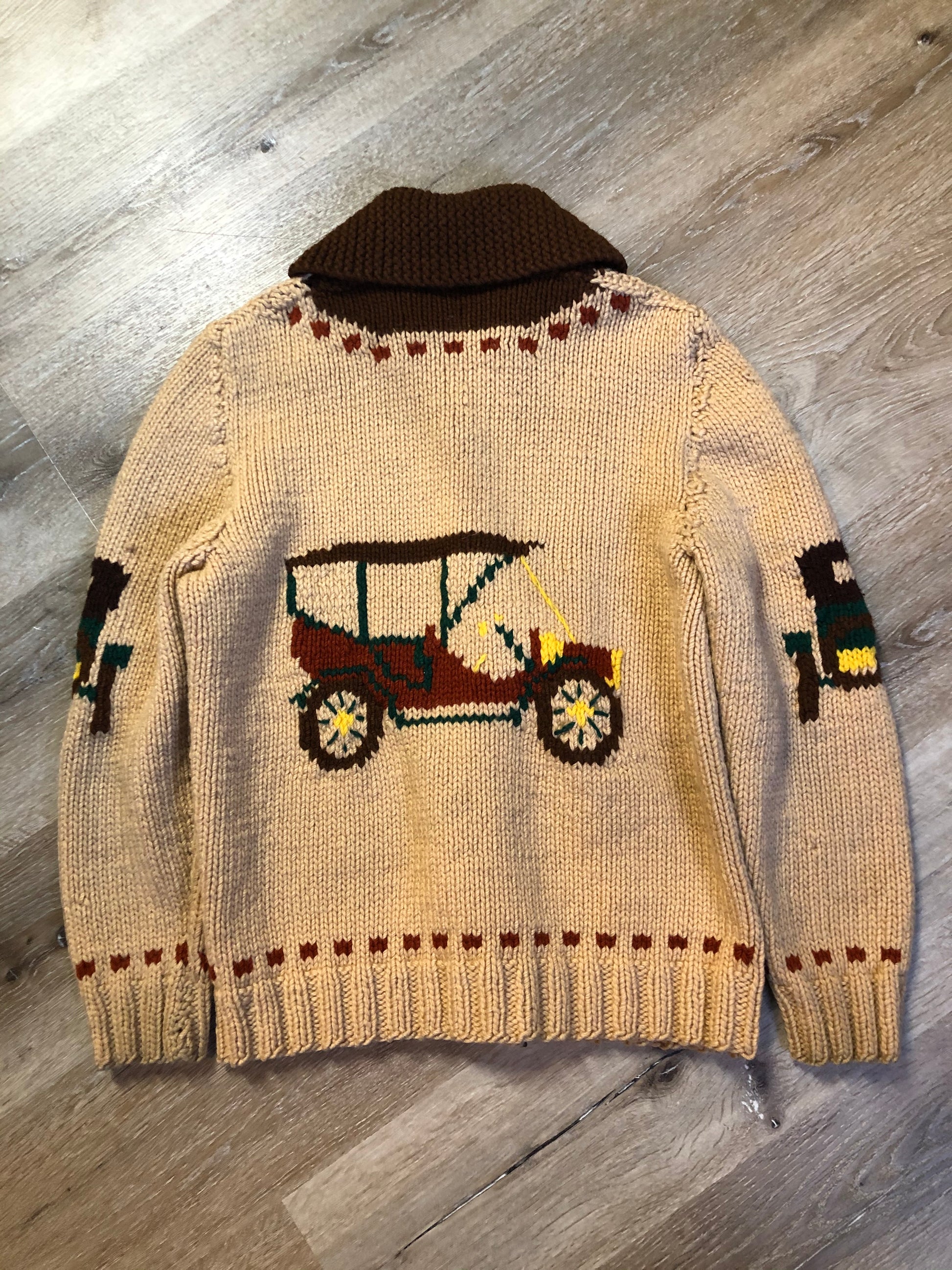 Kingspier Vintage - Mary Maxim hand knit zip cardigan in beige with dark brown, green and yellow antique car design. Made in Nova Scotia.