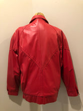Load image into Gallery viewer, Kingspier Vintage - Zaggara Designs red leather jacket with hidden zipper, slash pockets, inside pocket and a belt at the waist. Size small. 
