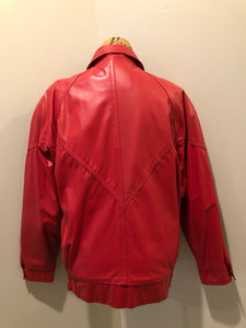 Kingspier Vintage - Zaggara Designs red leather jacket with hidden zipper, slash pockets, inside pocket and a belt at the waist. Size small. 