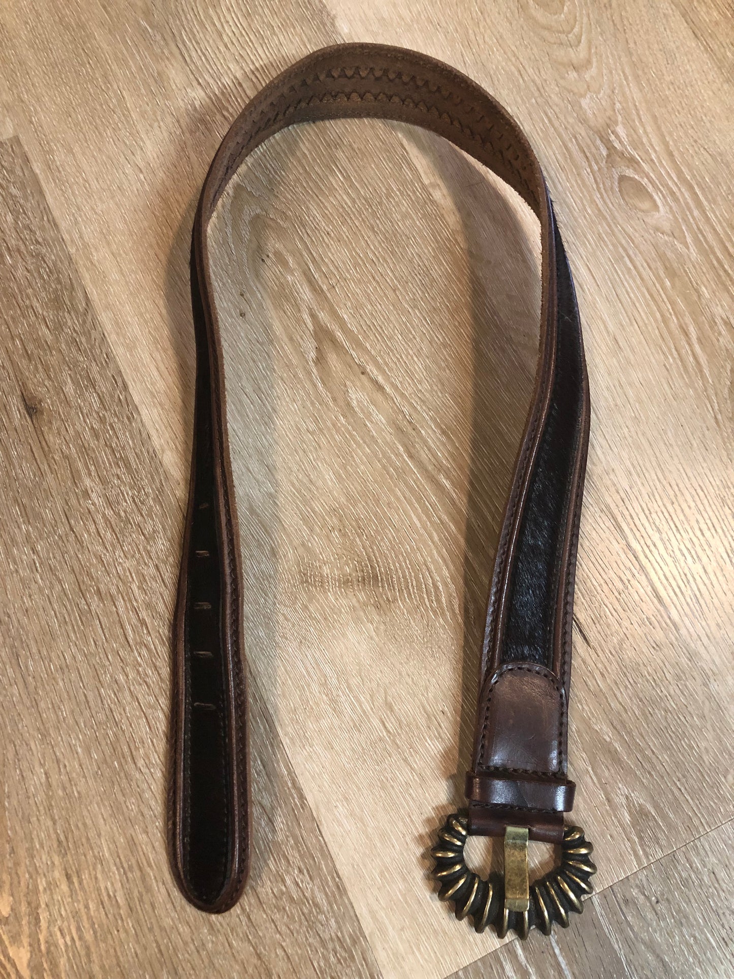 Kingspier Vintage -Vintage Gian Marco Venturi brown leather belt with hair on hide, brass buckle and leather stitching detail.