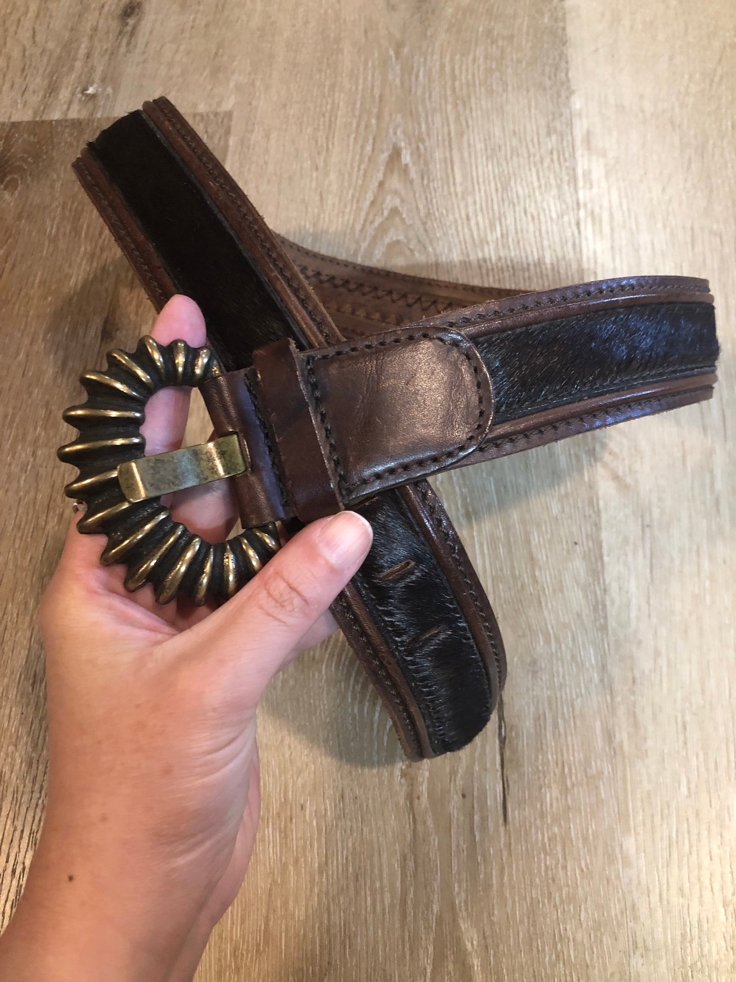 Kingspier Vintage -Vintage Gian Marco Venturi brown leather belt with hair on hide, brass buckle and leather stitching detail.