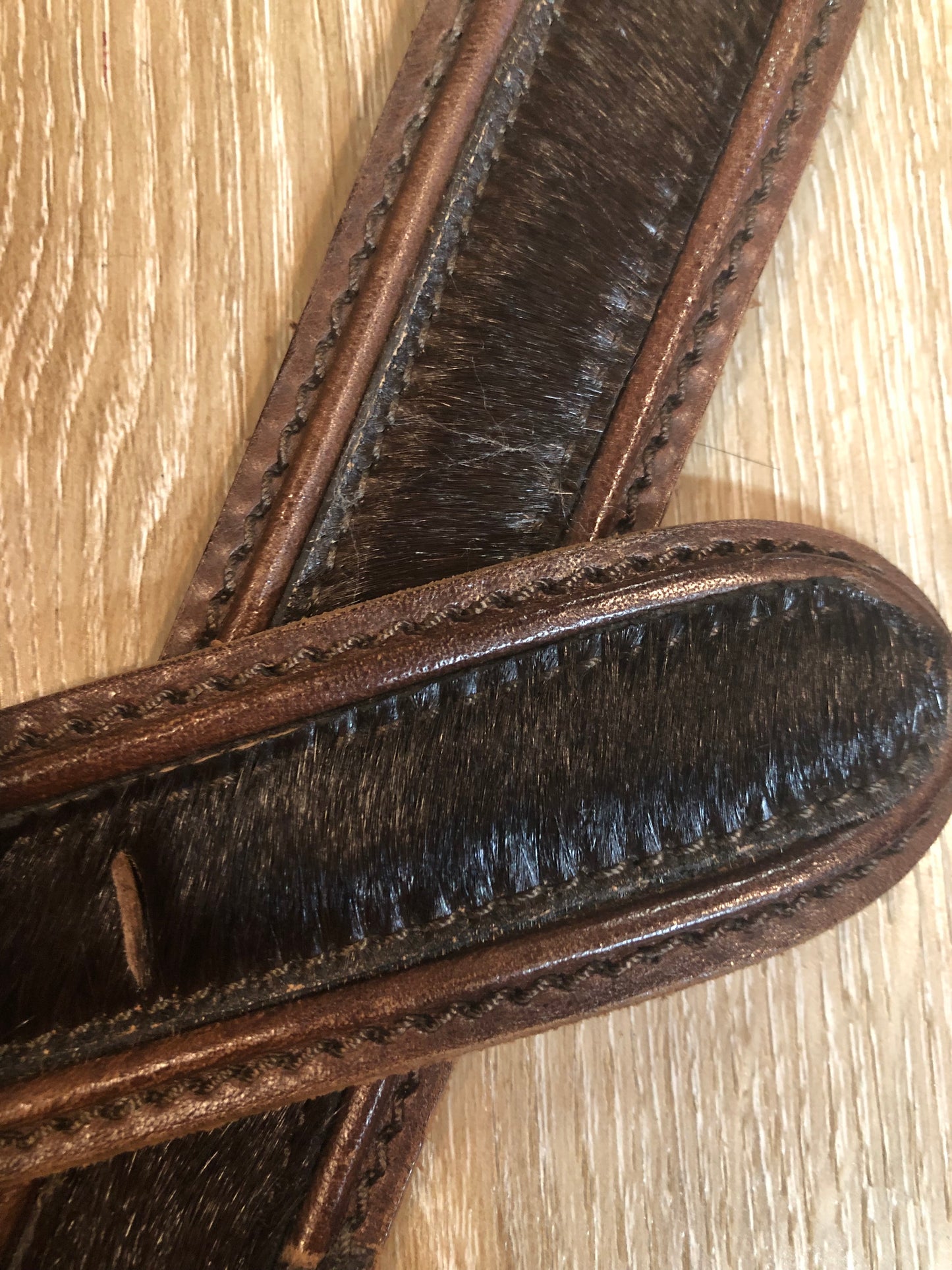 Kingspier Vintage -Vintage Gian Marco Venturi brown leather belt with hair on hide, brass buckle and leather stitching detail.