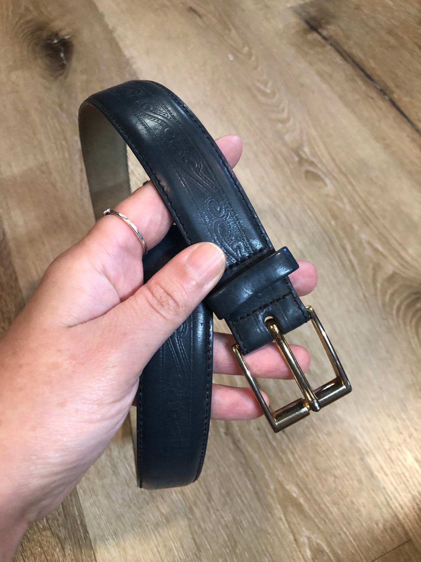 Kingspier Vintage -Vintage Cobbler navy embossed leather belt with silver buckle. Made in Spain.