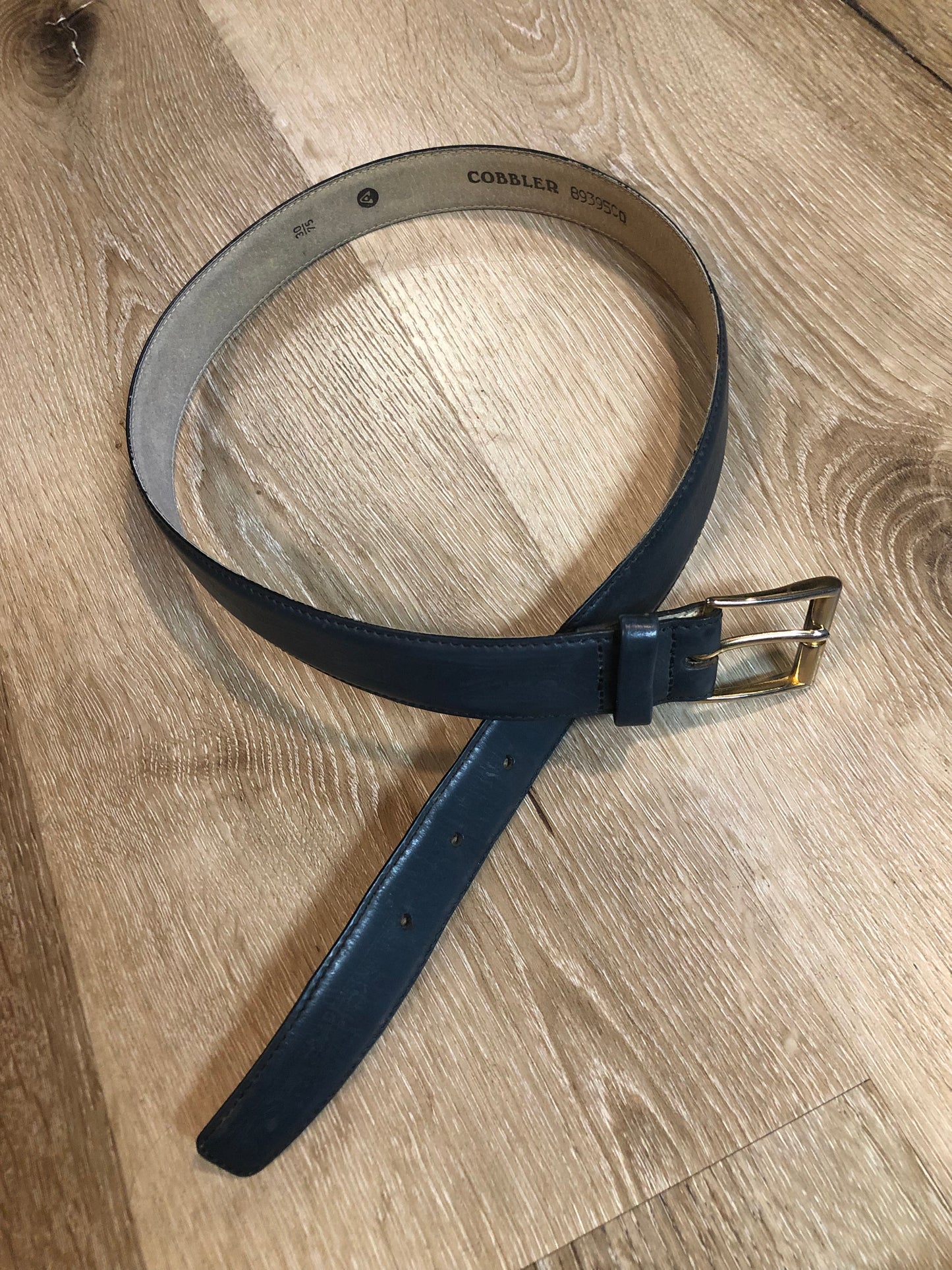 Kingspier Vintage -Vintage Cobbler navy embossed leather belt with silver buckle. Made in Spain.