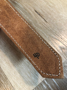 Kingspier Vintage -Vintage handtooled El Salvador brown full grain leather belt with crocodile motif and a leather wrapped buckle.