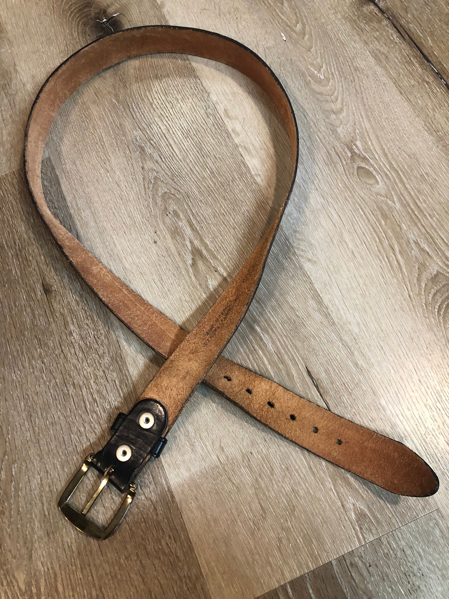Kingspier Vintage - Vintage Noma Leather black full grain leather firefighter belt with brass buckle and embossed illustration of the evolution of the fire truck from 1922-1984. Made in Canada