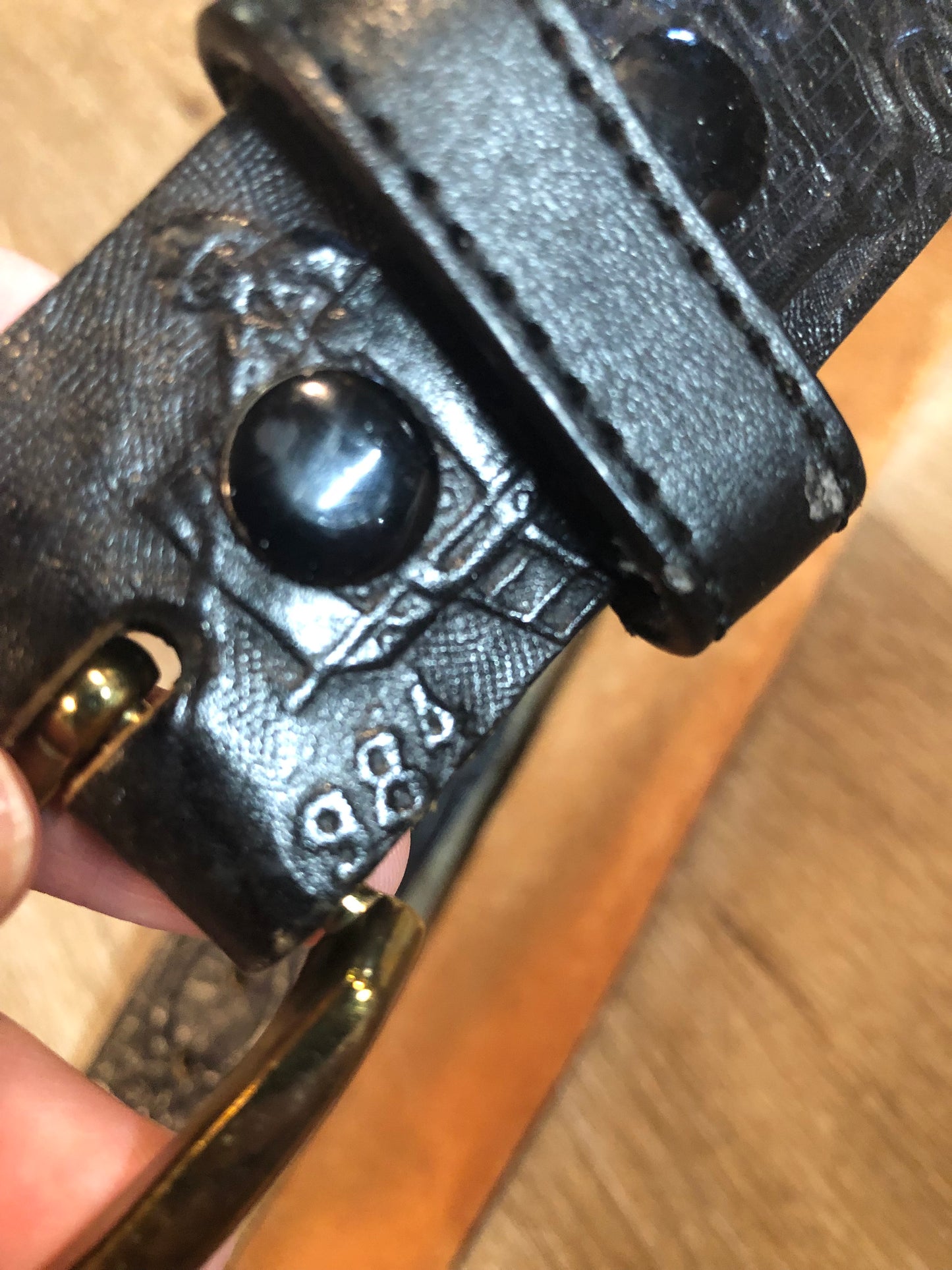 Kingspier Vintage - Vintage Noma Leather black full grain leather firefighter belt with brass buckle and embossed illustration of the evolution of the fire truck from 1922-1984. Made in Canada
