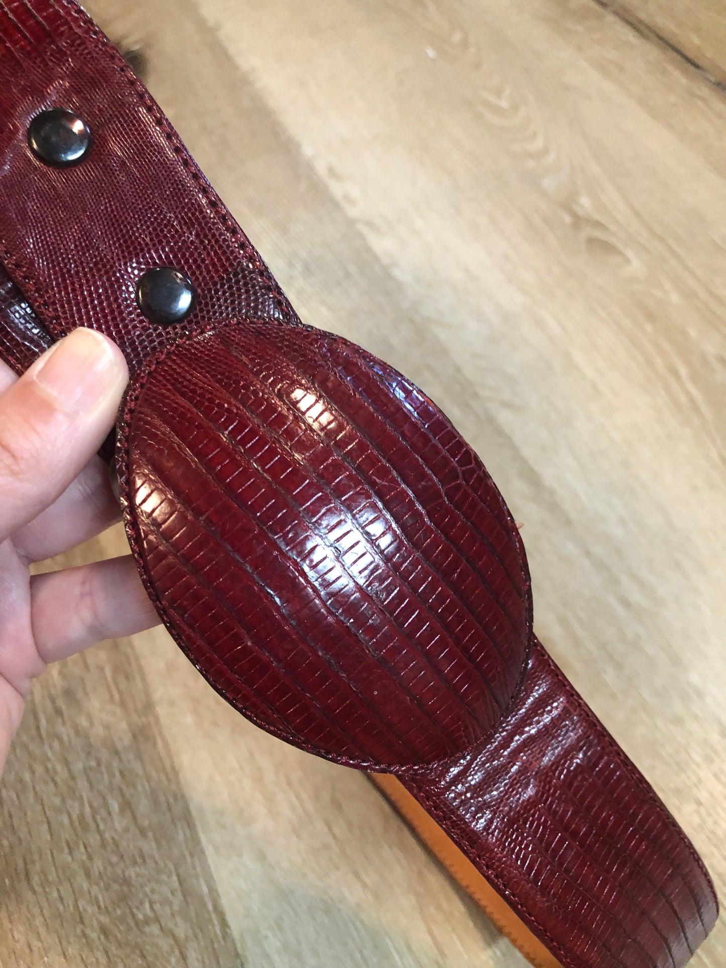 Kingspier Vintage - Vintage red reptile leather snap belt with wrapped buckle.