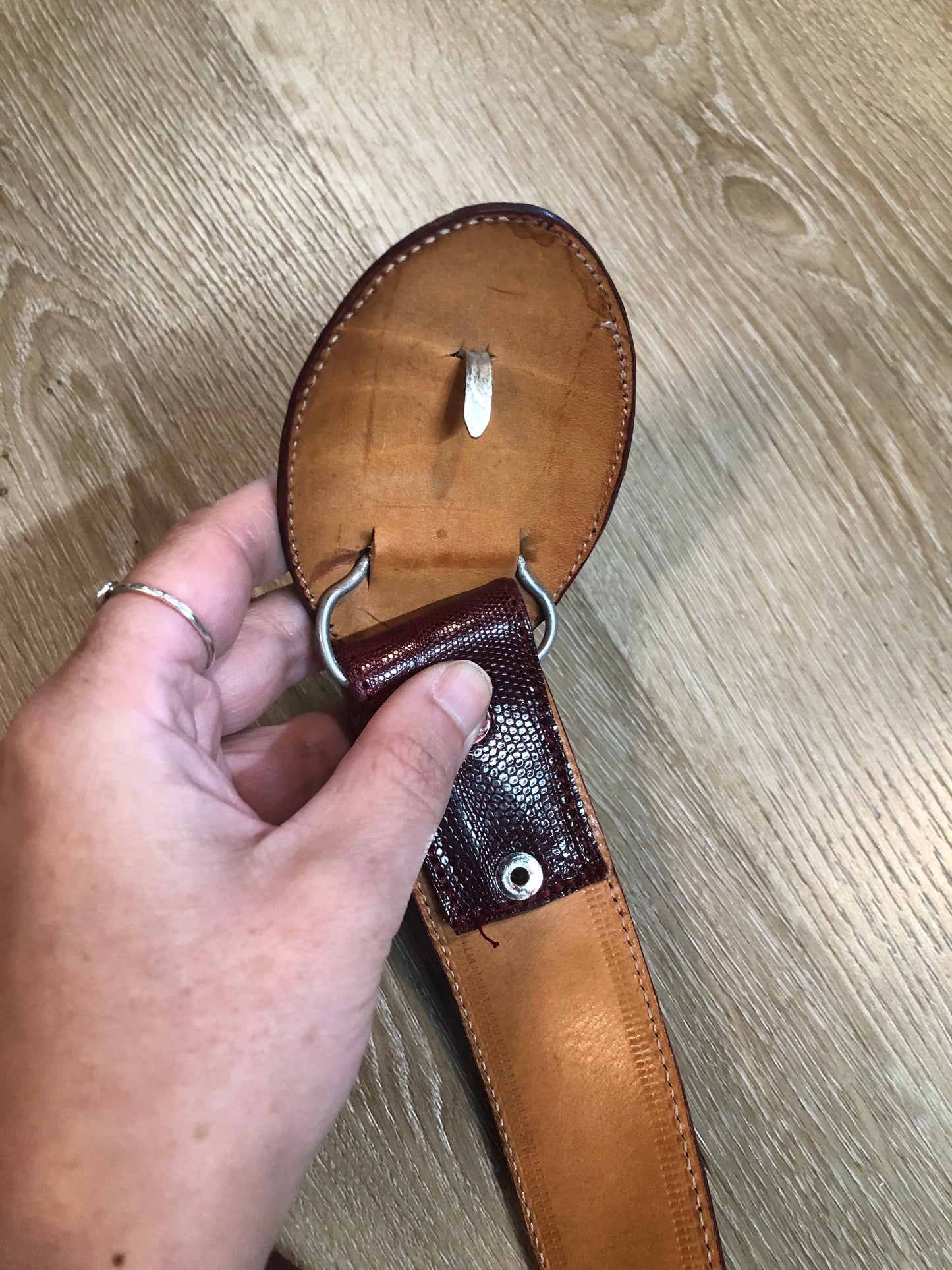 Kingspier Vintage - Vintage red reptile leather snap belt with wrapped buckle.