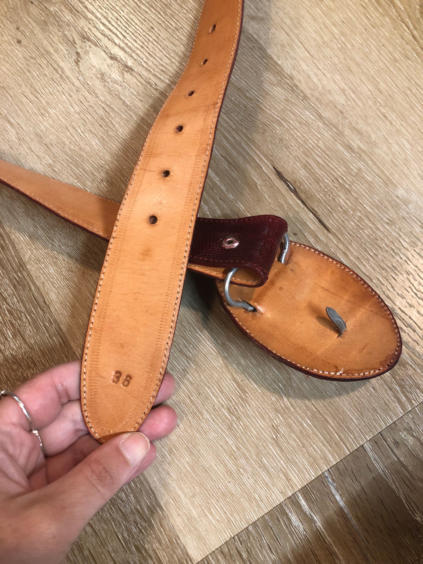Kingspier Vintage - Vintage red reptile leather snap belt with wrapped buckle.