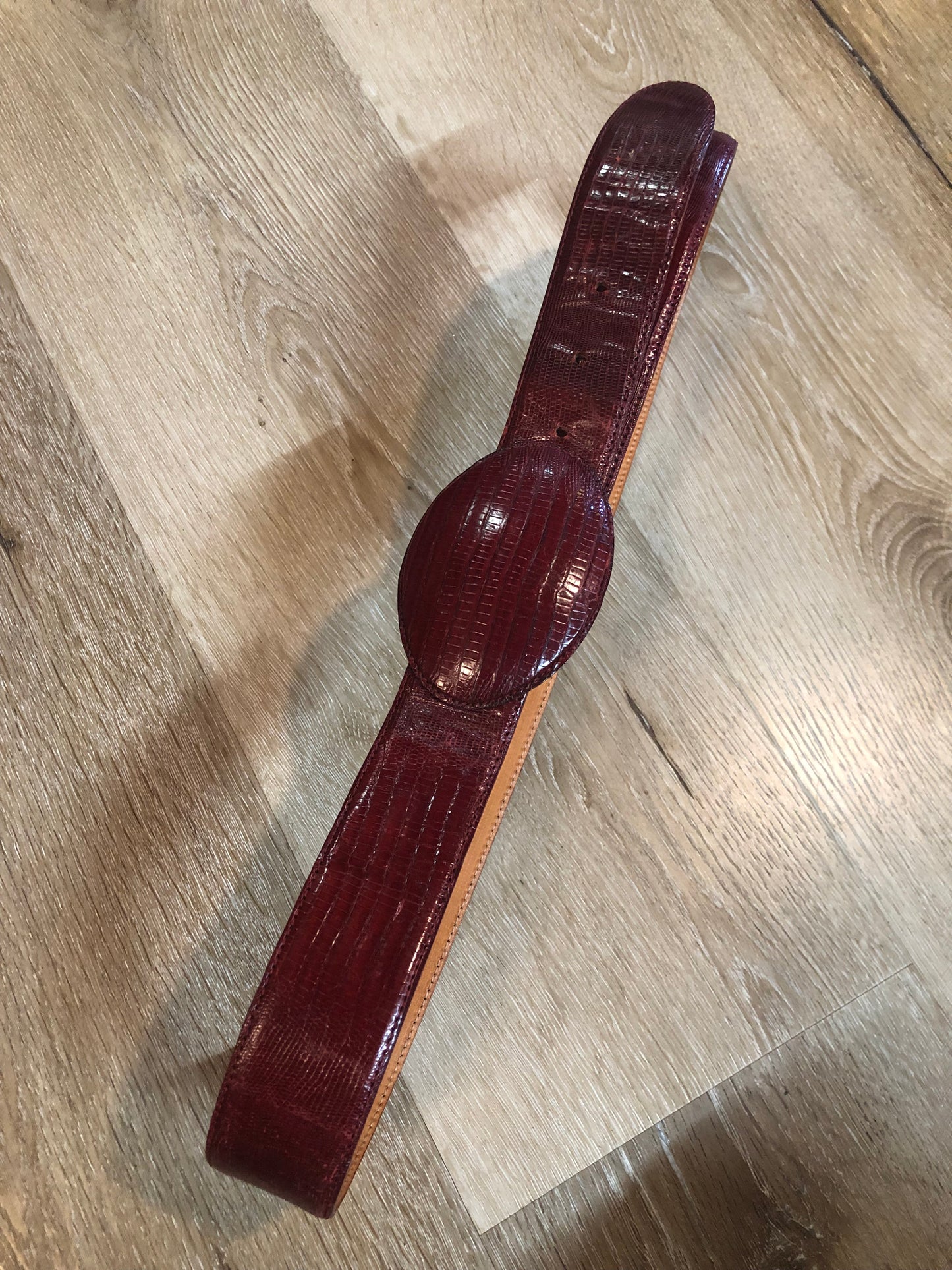 Kingspier Vintage - Vintage red reptile leather snap belt with wrapped buckle.