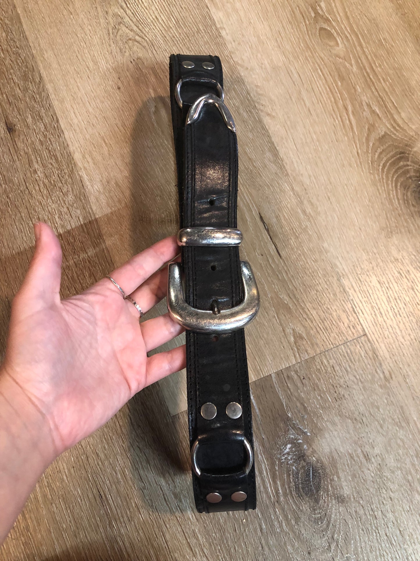 Kingspier Vintage - Vintage Guess Black Leather Belt with silver buckle and ring and grommet details.