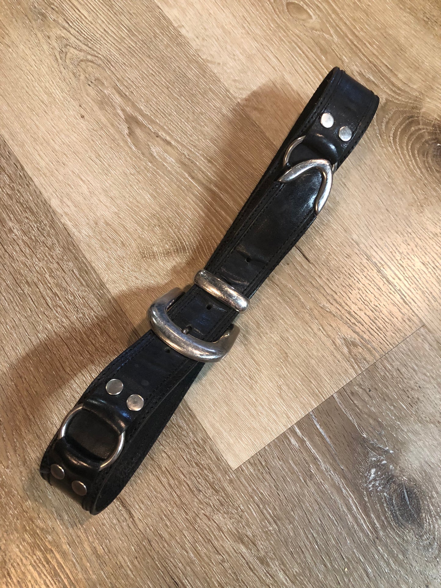 Kingspier Vintage - Vintage Guess Black Leather Belt with silver buckle and ring and grommet details.