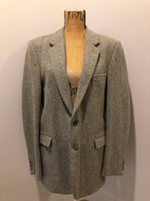 Load image into Gallery viewer, Kingspier Vintage - Harris Tweed grey 100% wool tweed jacket. This jacket is a two button, notch lapel with two flap pockets, a breast pocket and four inside pockets.
