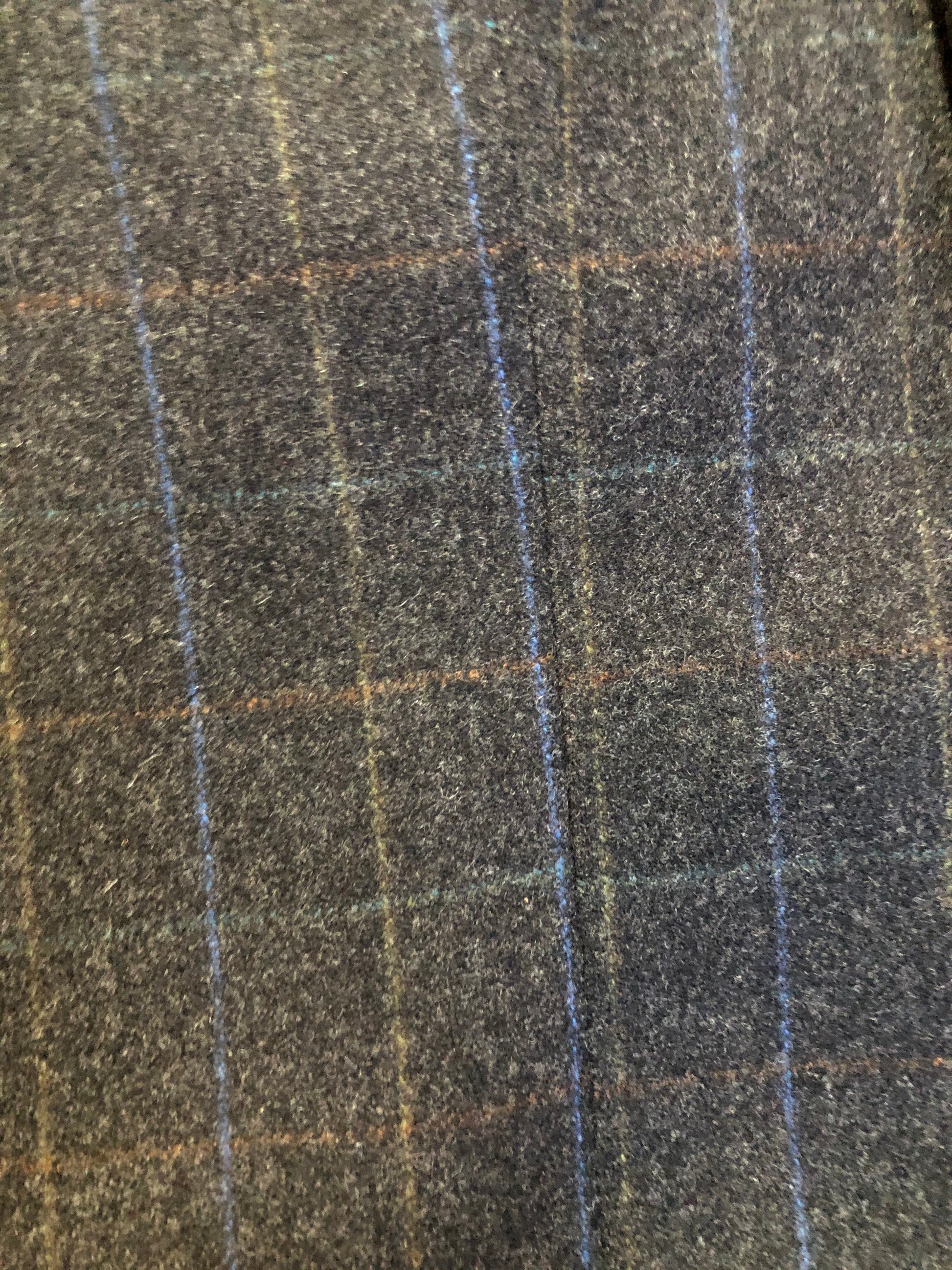 Kingspier Vintage - Chaps by Ralph Lauren slate grey with blue and red subtle stripe 100% wool jacket. This jacket is a two button, notch lapel with two flap pockets, a breast pocket and three inside pockets. Made in Canada.