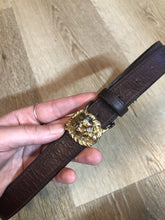 Load image into Gallery viewer, Kingspier Vintage - Vintage Ann Klein Caleche brown textured leather belt with gold lion’s head buckle.
