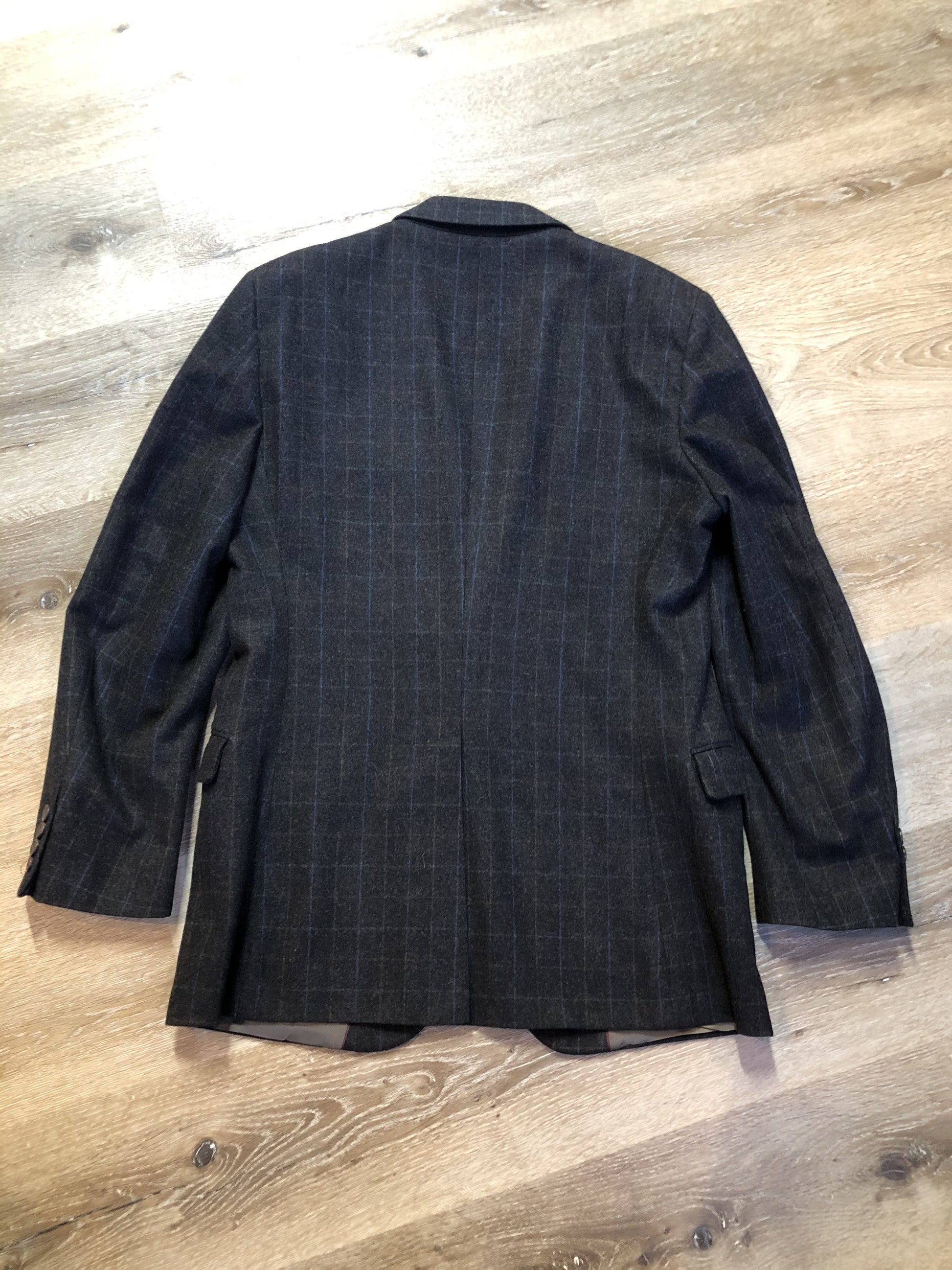 Kingspier Vintage - Chaps by Ralph Lauren slate grey with blue and red subtle stripe 100% wool jacket. This jacket is a two button, notch lapel with two flap pockets, a breast pocket and three inside pockets. Made in Canada.