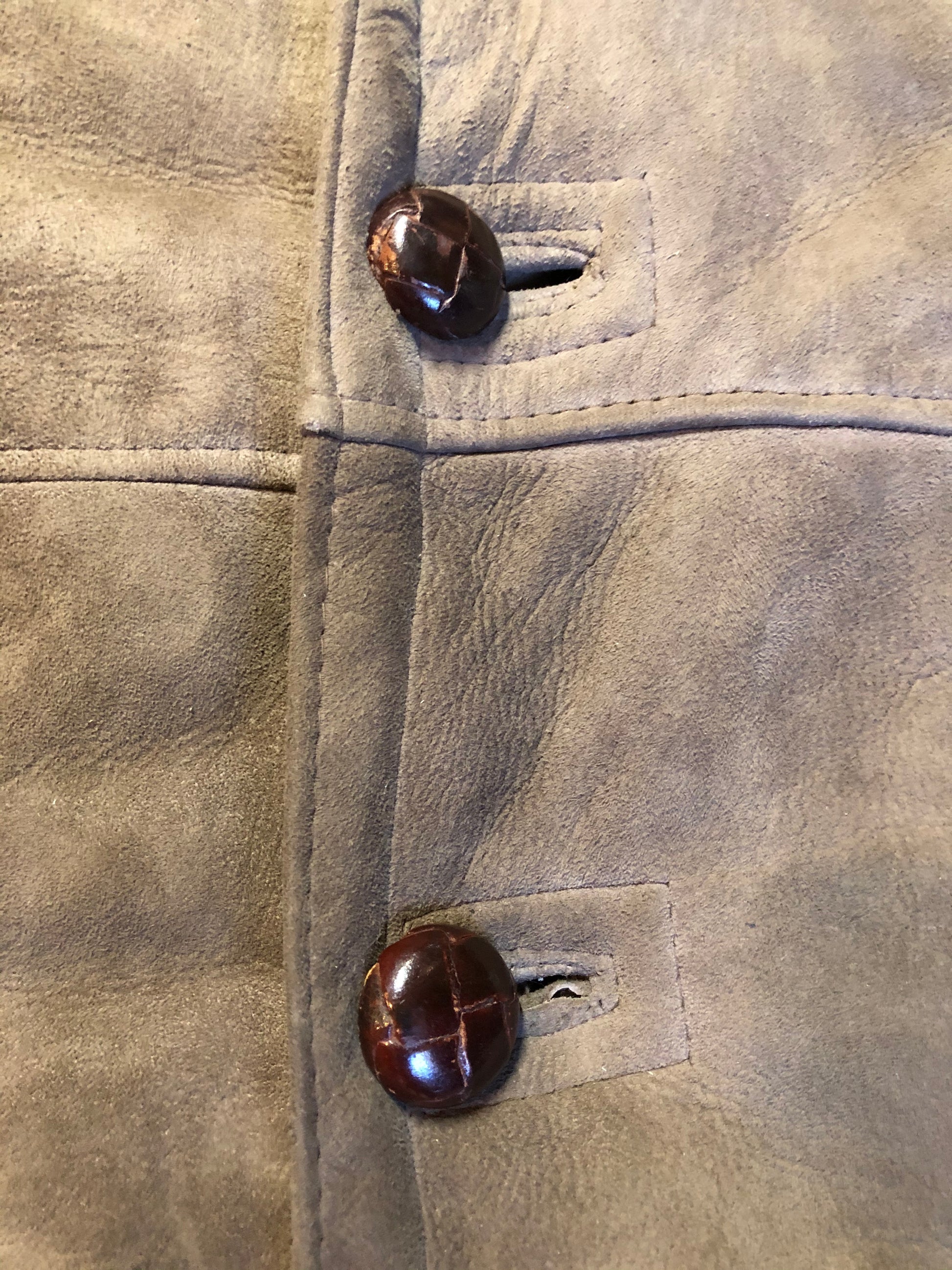 Kingspier Vintage - Medium brown suede coat with shearling trim and lining, button closures and patch pockets.