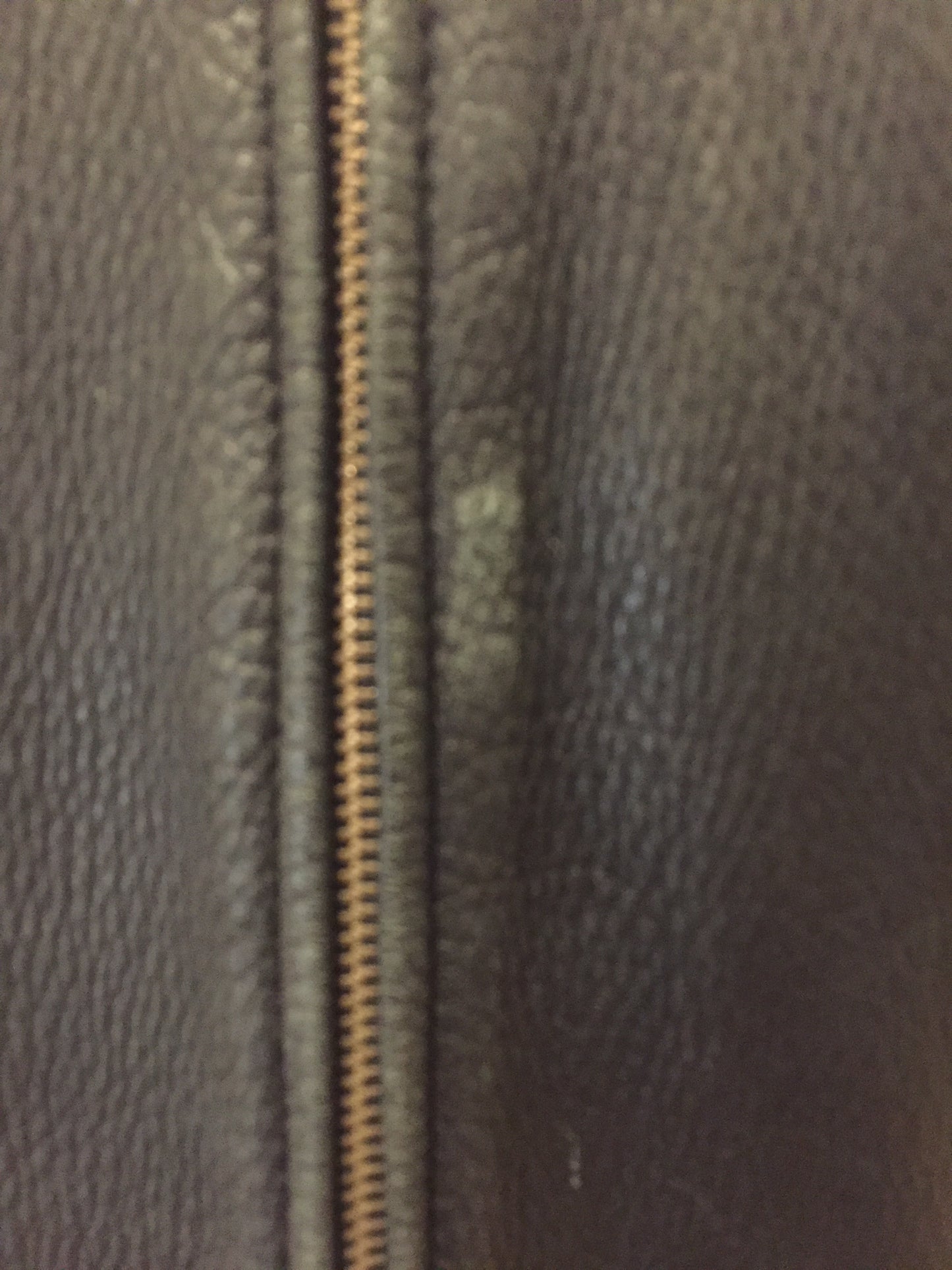 Kingspier Vintage - Roots black pebbled leather jacket with two vertical zip pockets and one zip pocket on the chest. Made in Canada. Size medium.