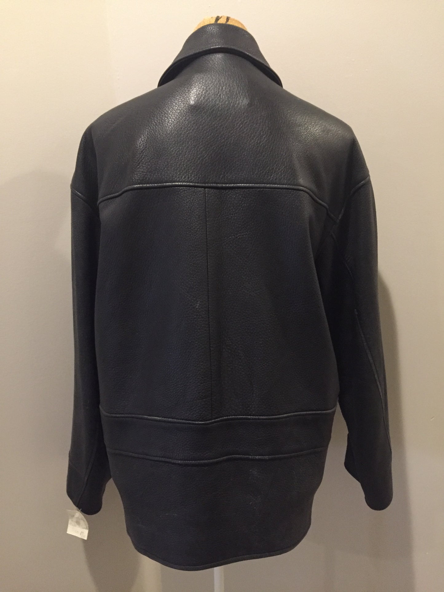 Kingspier Vintage - Roots black pebbled leather jacket with two vertical zip pockets and one zip pocket on the chest. Made in Canada. Size medium.