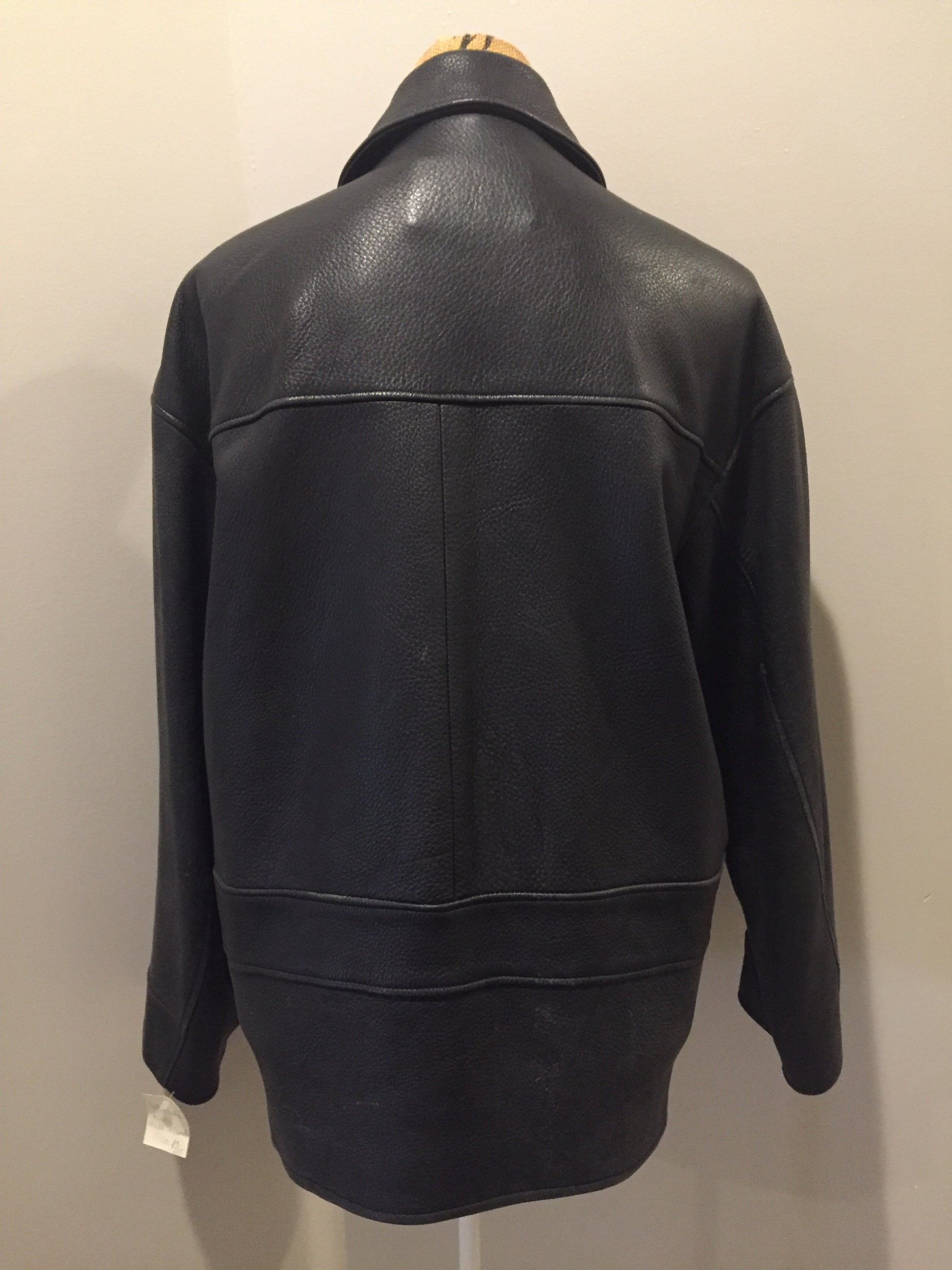 Kingspier Vintage - Roots black pebbled leather jacket with two vertical zip pockets and one zip pocket on the chest. Made in Canada. Size medium.