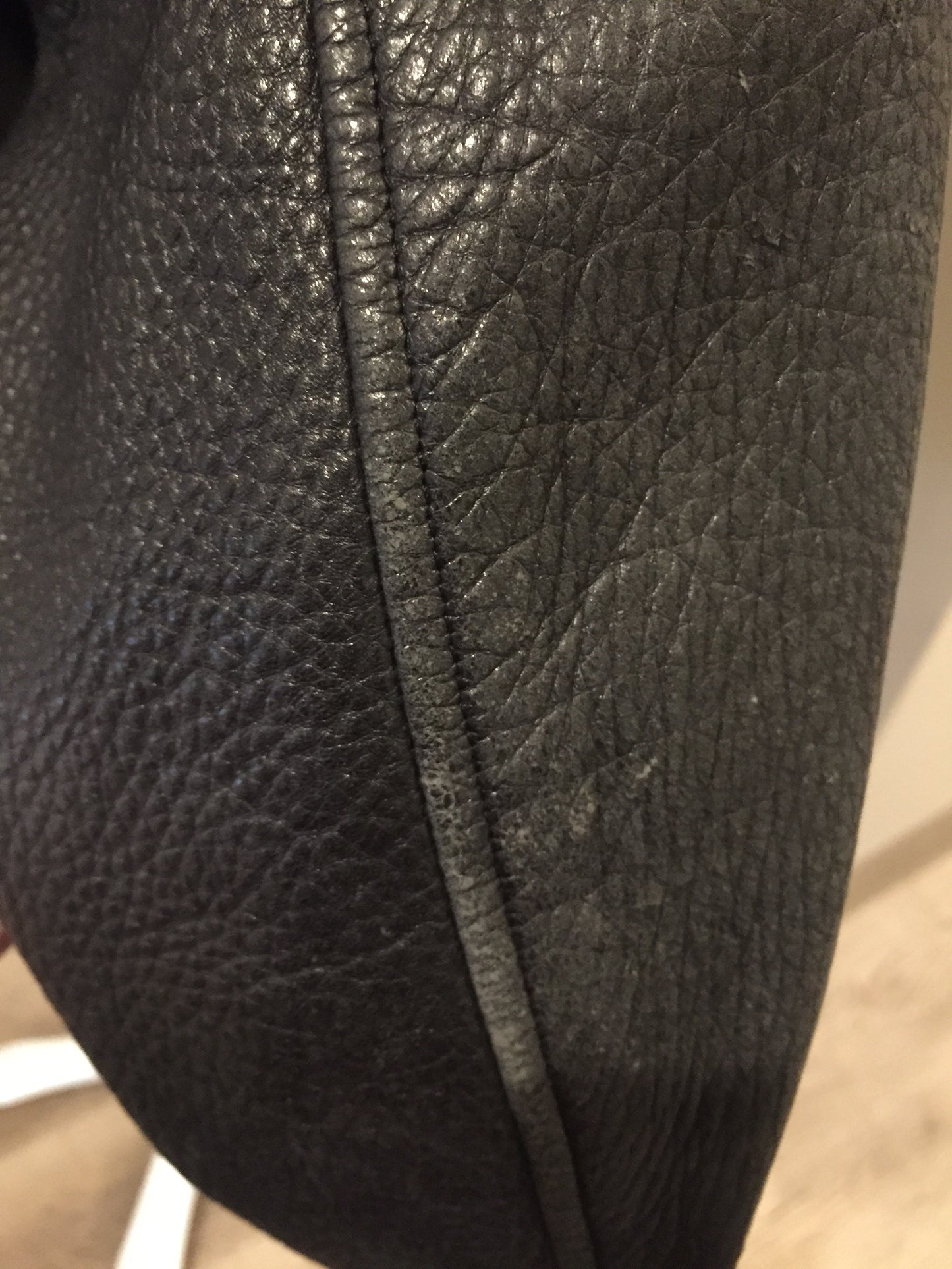 Kingspier Vintage - Roots black pebbled leather jacket with two vertical zip pockets and one zip pocket on the chest. Made in Canada. Size medium.