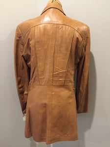 Kingspier Vintage - Roger de Blois inc brown leather jacket with button closures, two slash pockets, two flap pockets on the chest and a quilted lining. Made in Quebec.