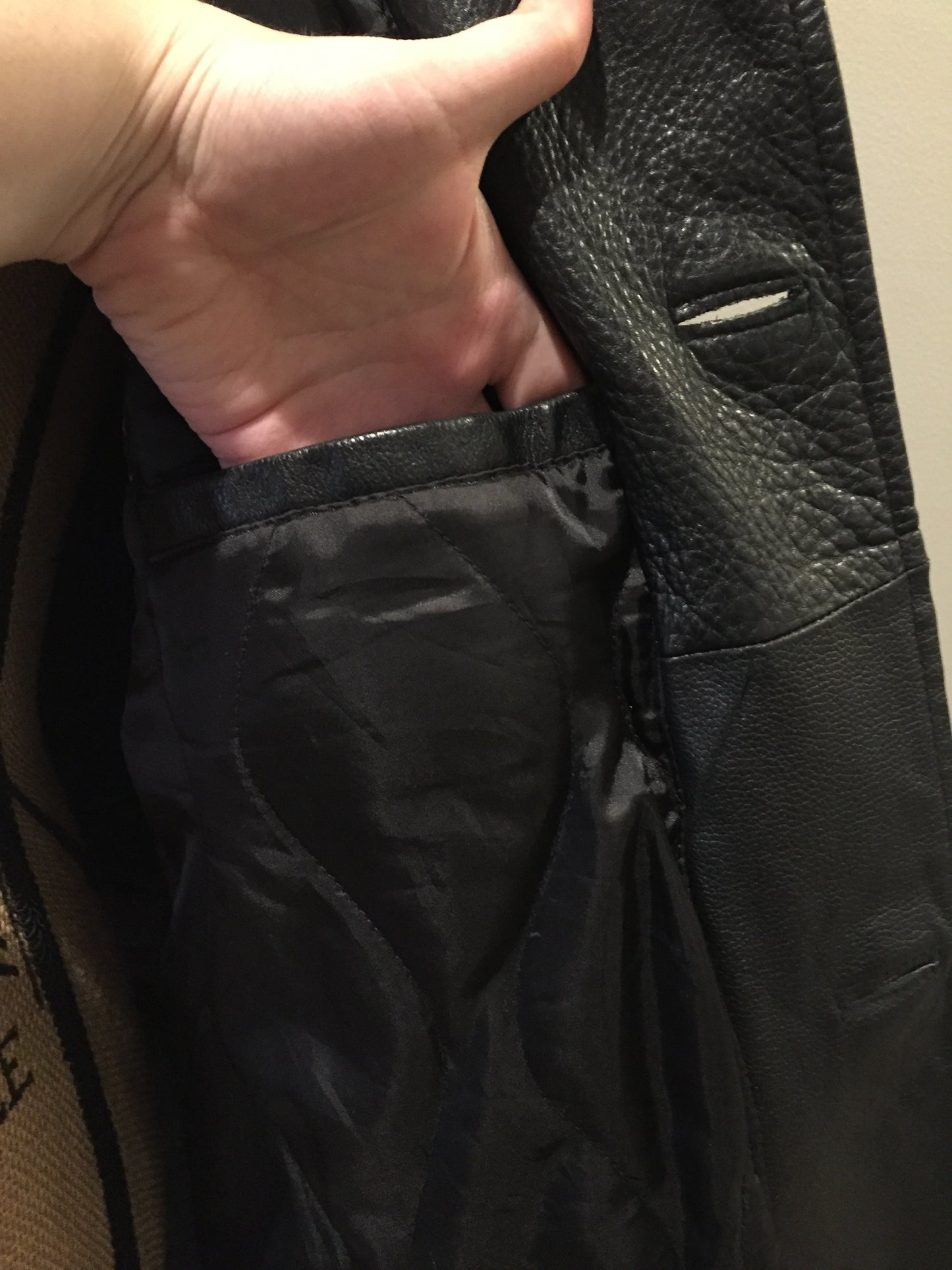 Kingspier Vintage - Gap black leather jacket with button closures, slash pockets, inside pocket and quilted lining. Size large.