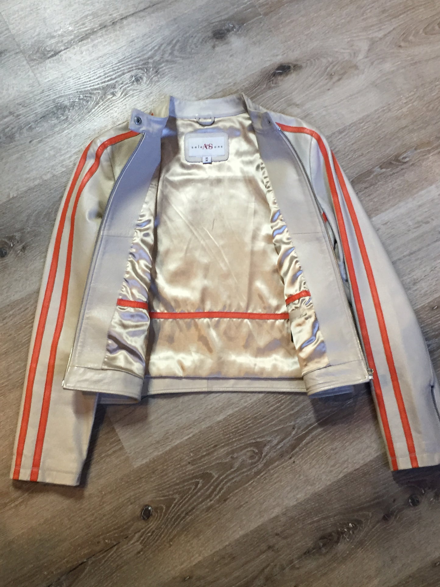 Kingspier Vintage - A&S Selections beige with orange stripe moto jacket with zipper closure, vertical zip pockets and zipper at the sleeve. Size medium.