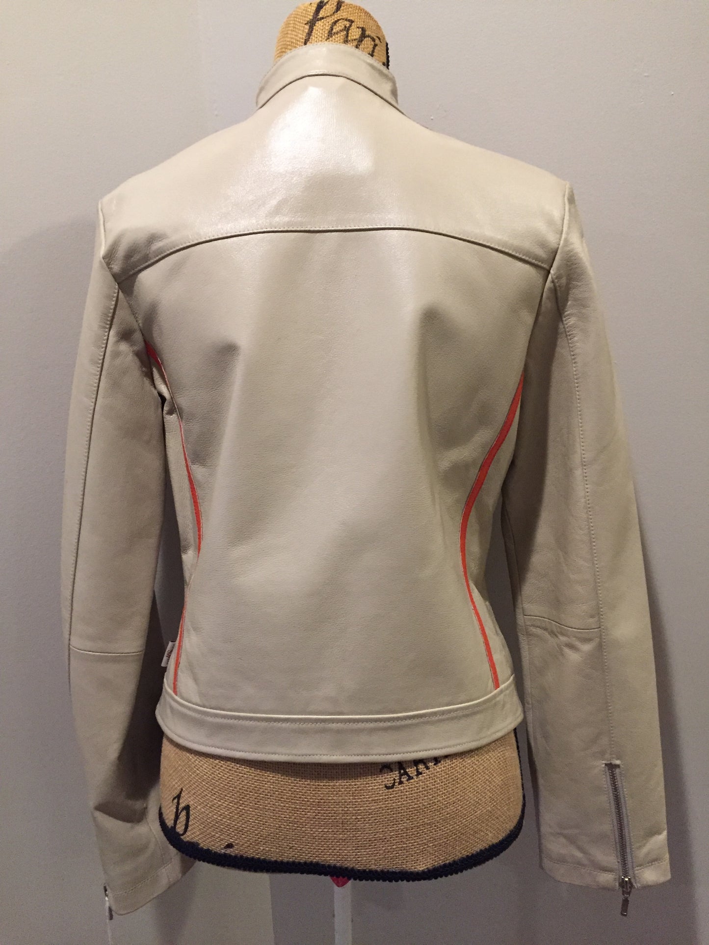 Kingspier Vintage - A&S Selections beige with orange stripe moto jacket with zipper closure, vertical zip pockets and zipper at the sleeve. Size medium.