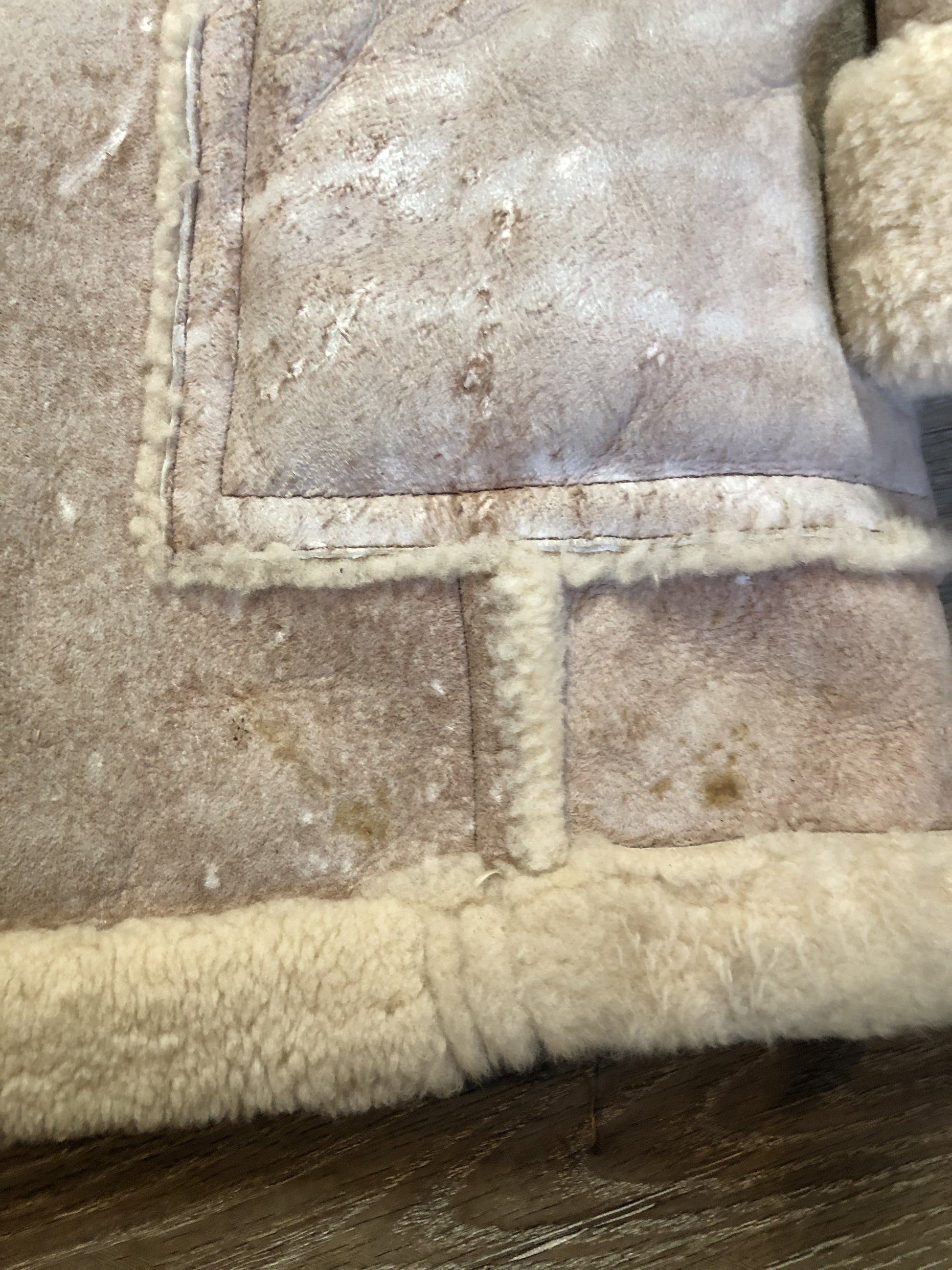 Kingspier Vintage - Dave Epstein “Rice Sportswear” beige suede coat with shearling trim and lining, button closures and patch pockets. Made in Canada.