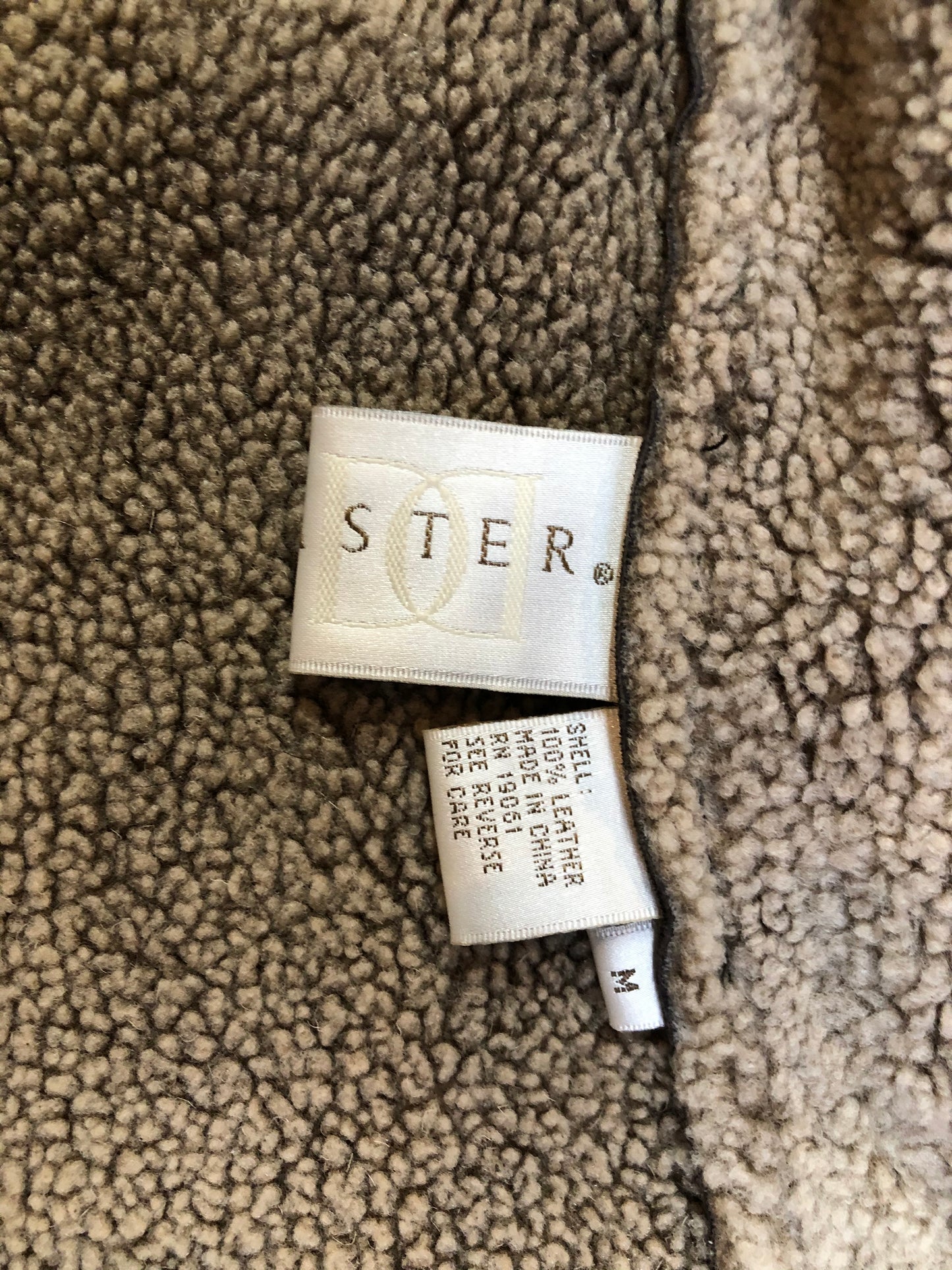 Kingspier Vintage - Doncaster shearling coat with shearling lining, button closures and patch pockets. Size medium.