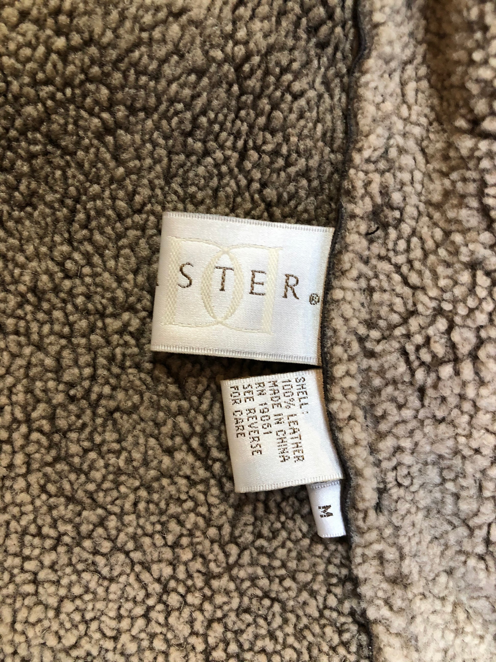 Kingspier Vintage - Doncaster shearling coat with shearling lining, button closures and patch pockets. Size medium.