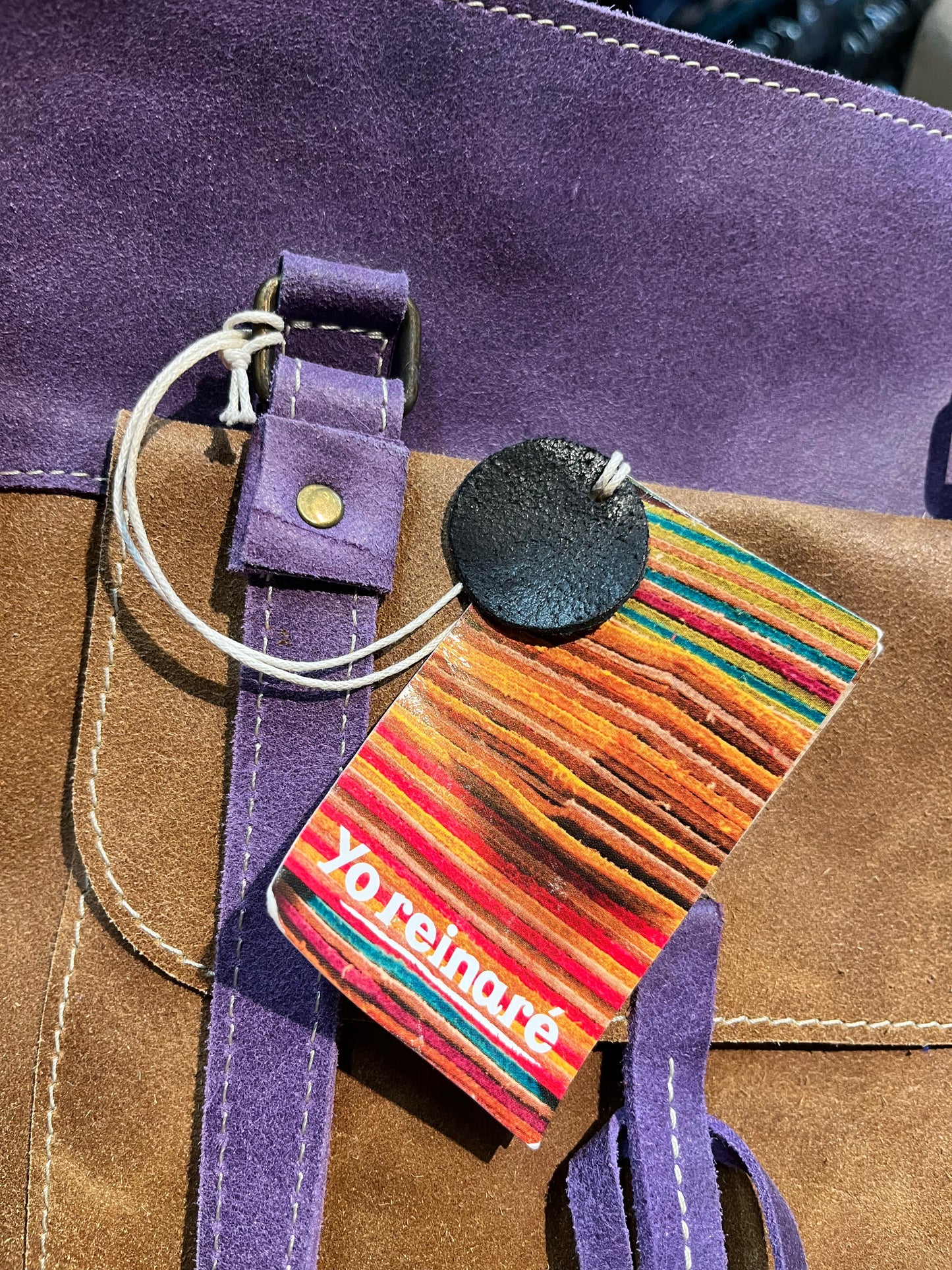 Yoreinare brown and purple leather handbag with zip closure, one pocket inside the main compartment and one small pocket on the front and back.
New with tags
Made in Columbia