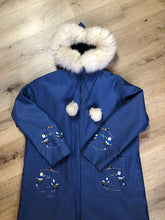 Load image into Gallery viewer, Kingspier Vintage - Blue northern parka made by Marilyn Bessey with wool blend lining, hood with white fur trim, fur Pom poms, zipper closure, patch pockets, arctic life design embroidered on the front pockets and the sleeves. Made in Canada. 
