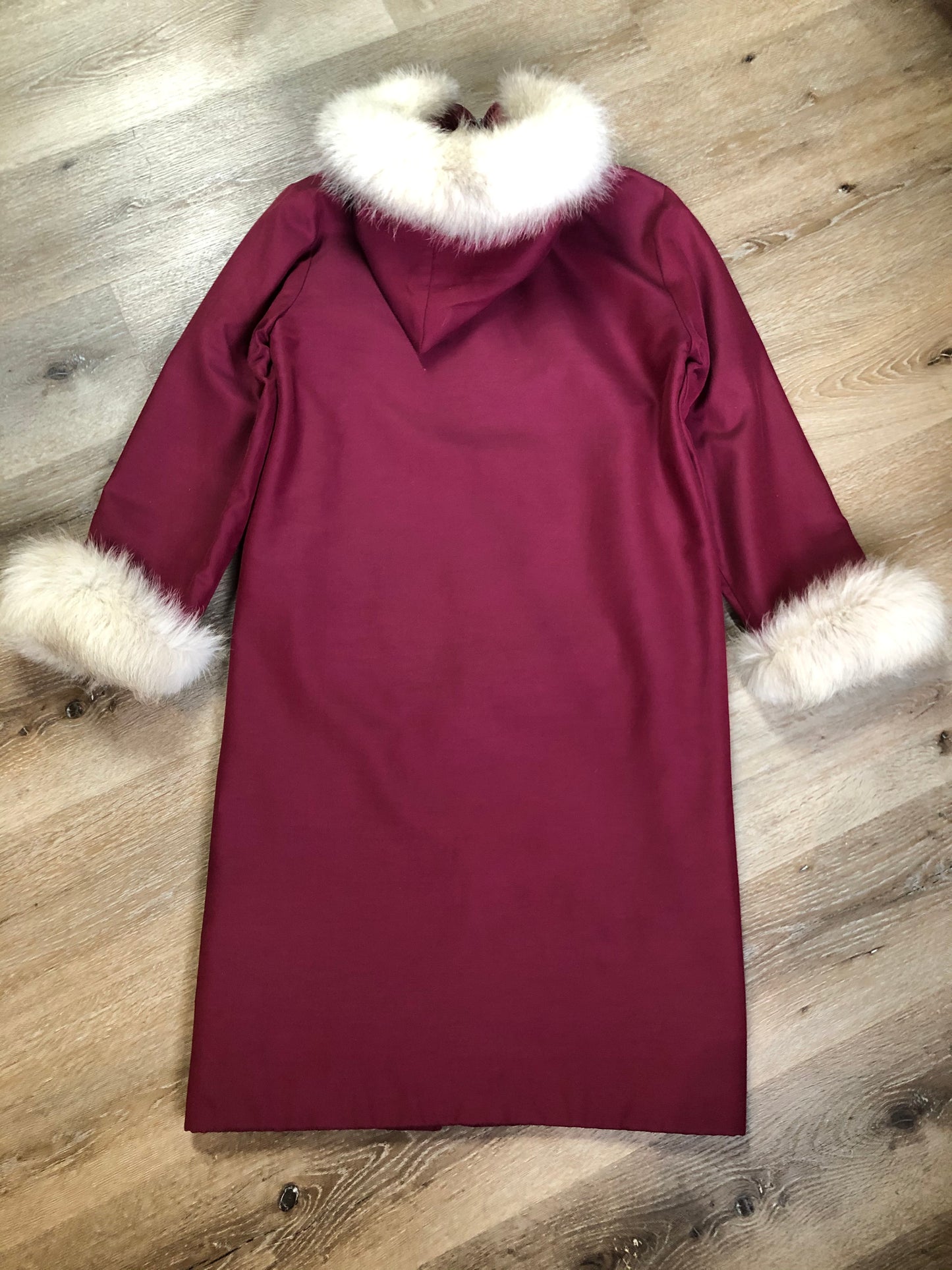 Kingspier Vintage - Pink Northern parka with wool blend lining, hood and sleeves with white fur trim, fur Pom poms, zipper closure, patch pockets, canoe design embroidered on the front pockets. Made in Canada.