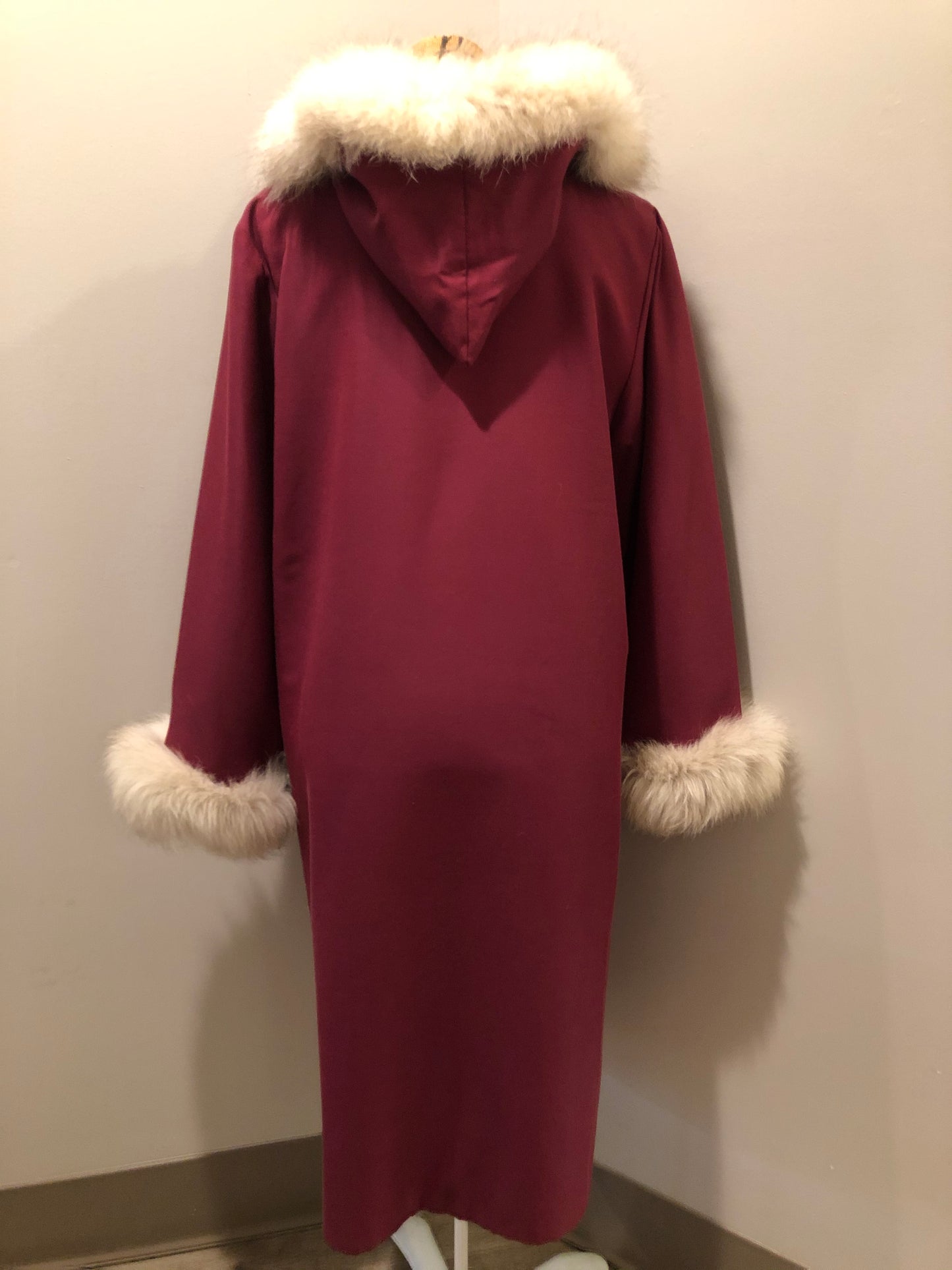 Kingspier Vintage - Pink Northern parka with wool blend lining, hood and sleeves with white fur trim, fur Pom poms, zipper closure, patch pockets, canoe design embroidered on the front pockets. Made in Canada.