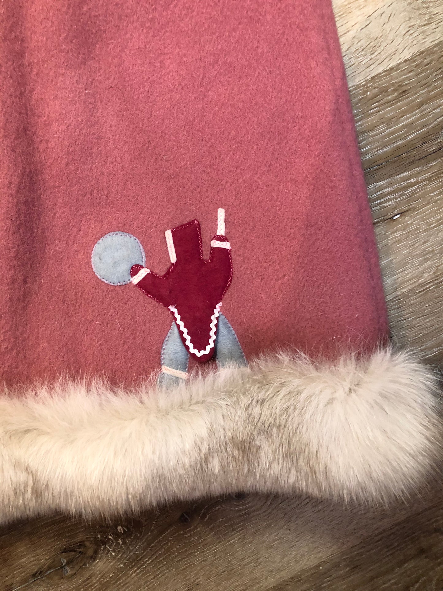 Kingspier Vintage - “Styles North” pink northern parka with removable outer shell featuring a hood with white fur trim, zipper closure, lining, patch pockets, felt warrior appliqué design on the front and back. Made in Canada.