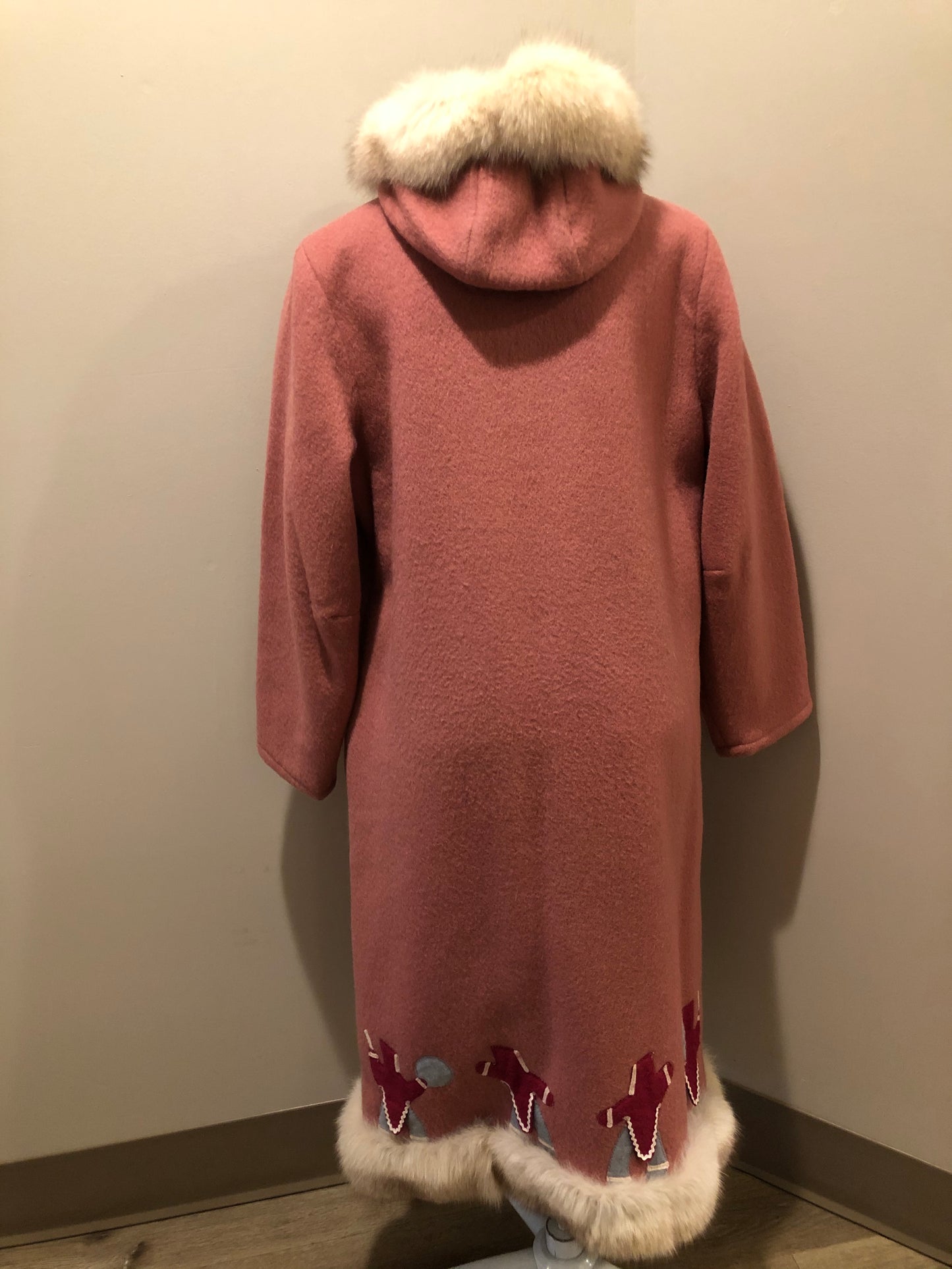 Kingspier Vintage - “Styles North” pink northern parka with removable outer shell featuring a hood with white fur trim, zipper closure, lining, patch pockets, felt warrior appliqué design on the front and back. Made in Canada.
