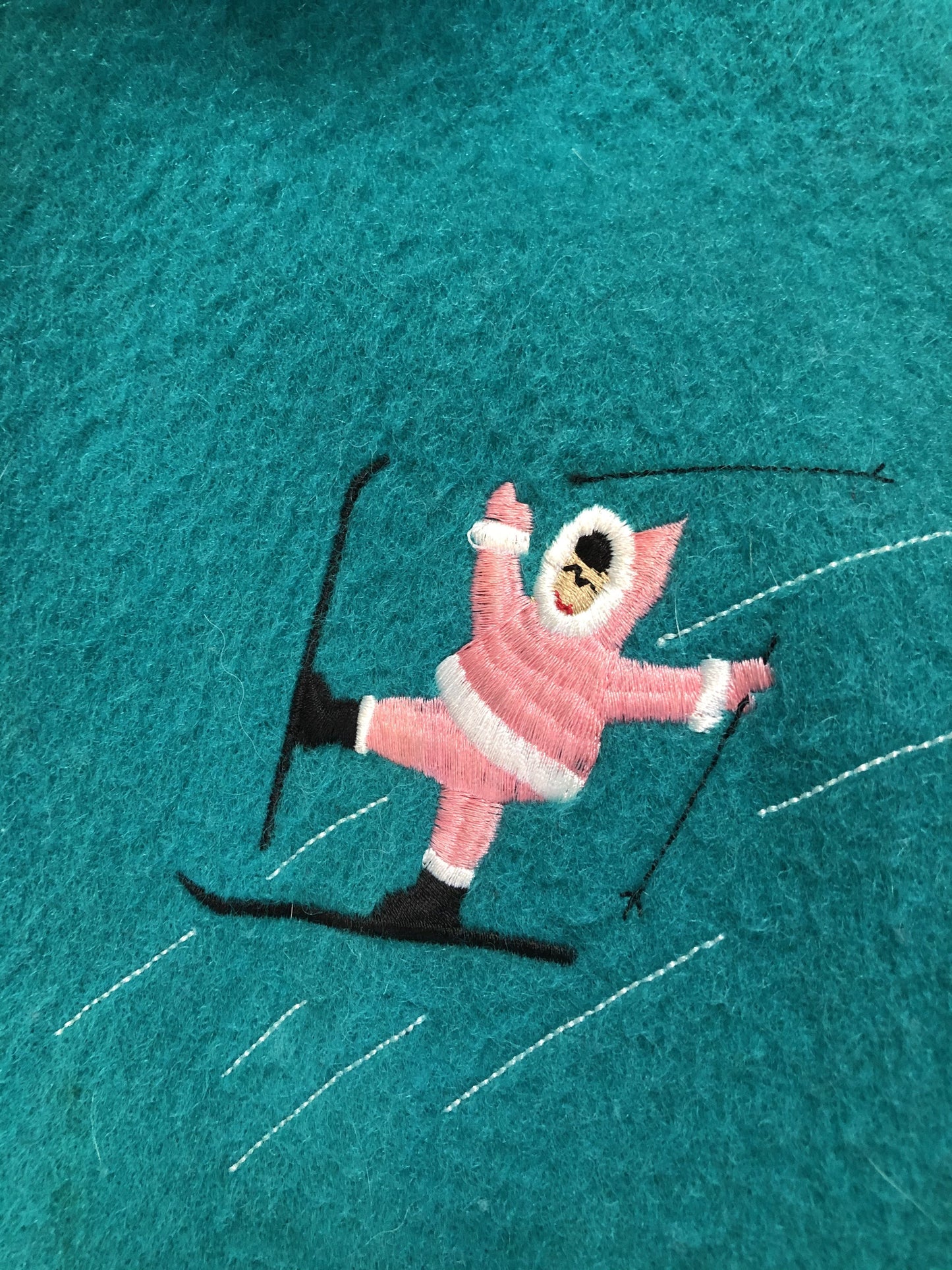 Kingspier Vintage - Children’s Turquoise Wool Humber Handcrafts northern parka featuring a hood, white fur trim, zipper closure, lining, embroidered winter scenes along the front. Made in Canada.